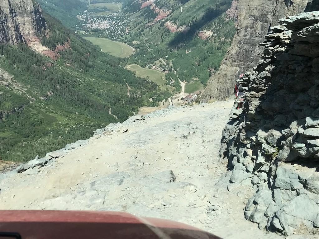 Jeep Gladiator Gladiator on a tight Black Bear Pass switchback. Drone footage. i-mJ2MbSf-XL