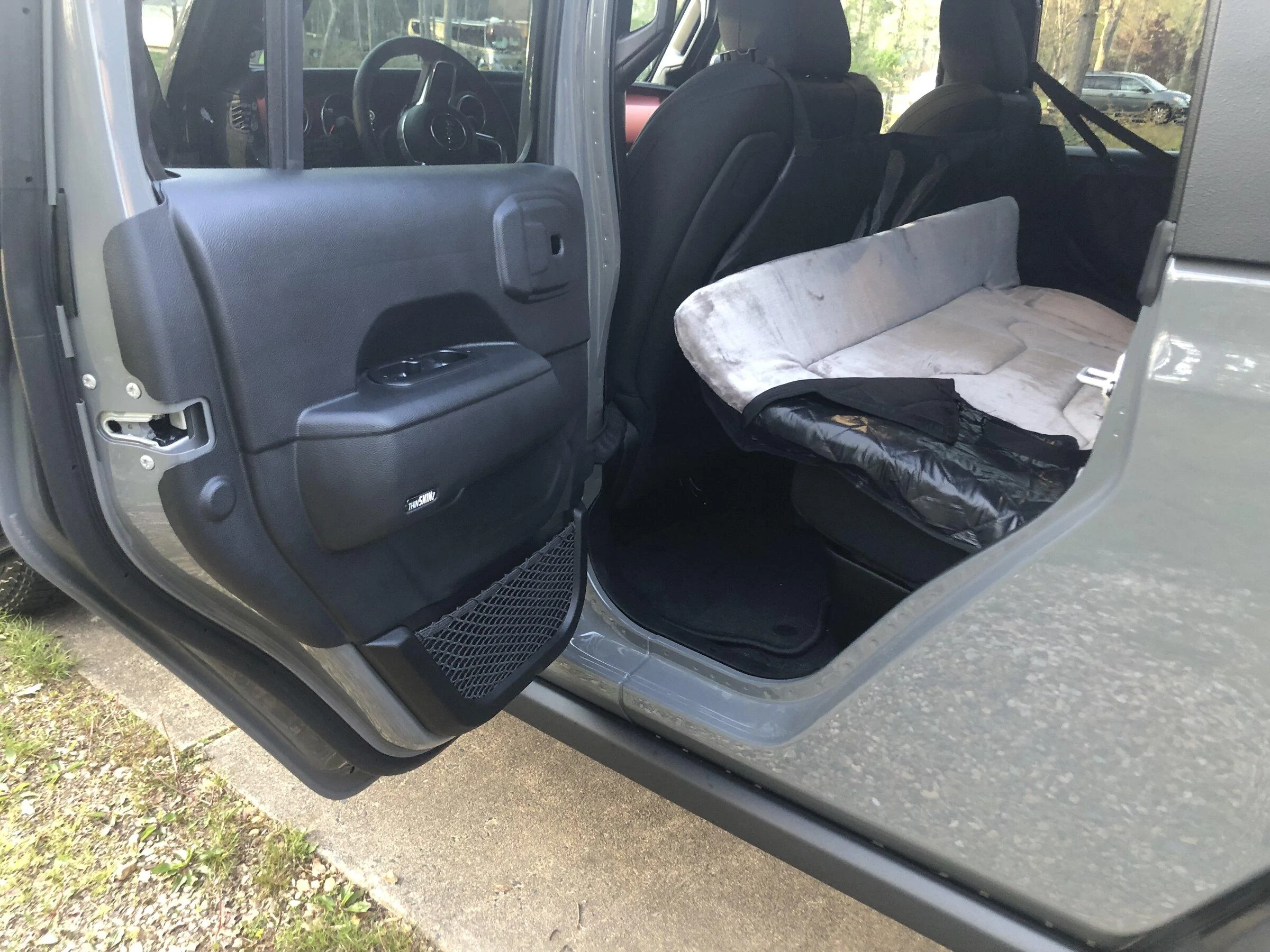 Jeep Gladiator Rear seat delete with foam floor for dogs - cheap, easy and it works great 2C294831-7DC9-4188-8028-68A247BABD43