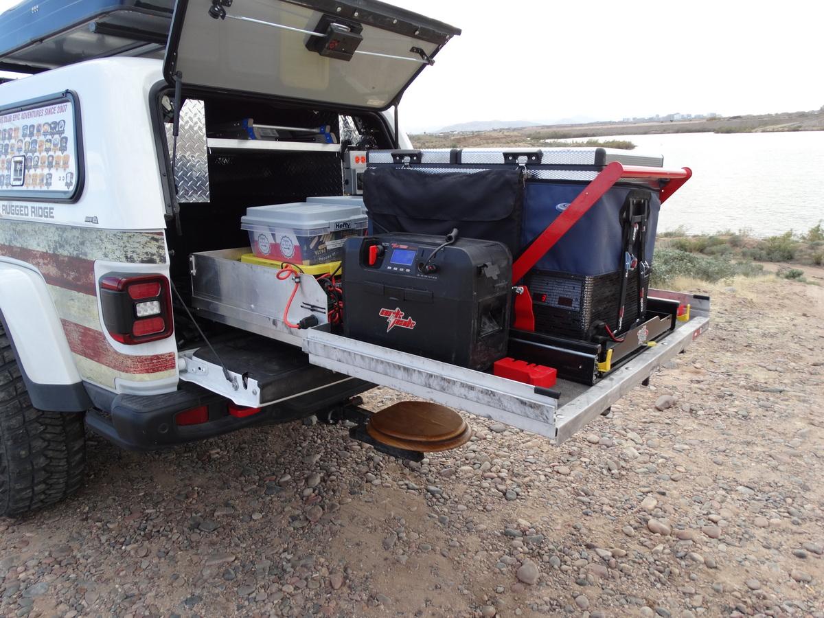 Jeep Gladiator A.R.E. CX EVOLVE CAP installed The Cargo Glide pulls out to the end of the bed making access to totes of supplies easy to get...JPG