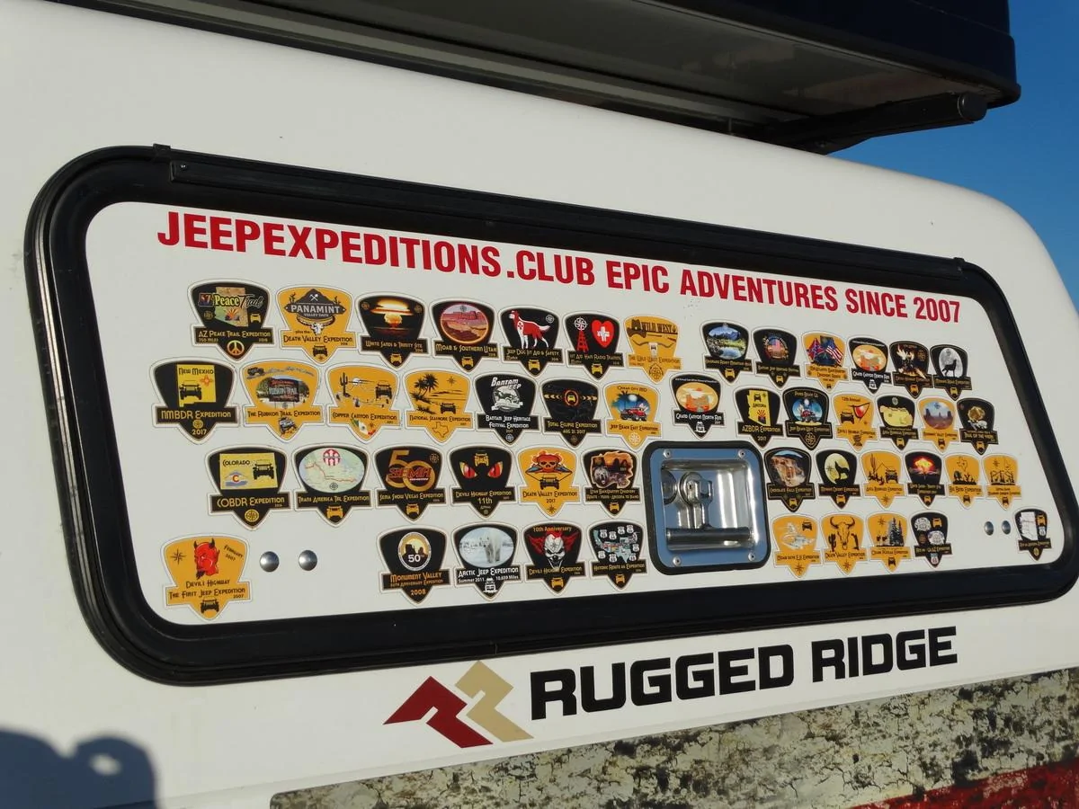 Jeep Gladiator A.R.E. CX EVOLVE CAP installed Jeep Expeditions Epic Adcentures on ARE alumimum side door