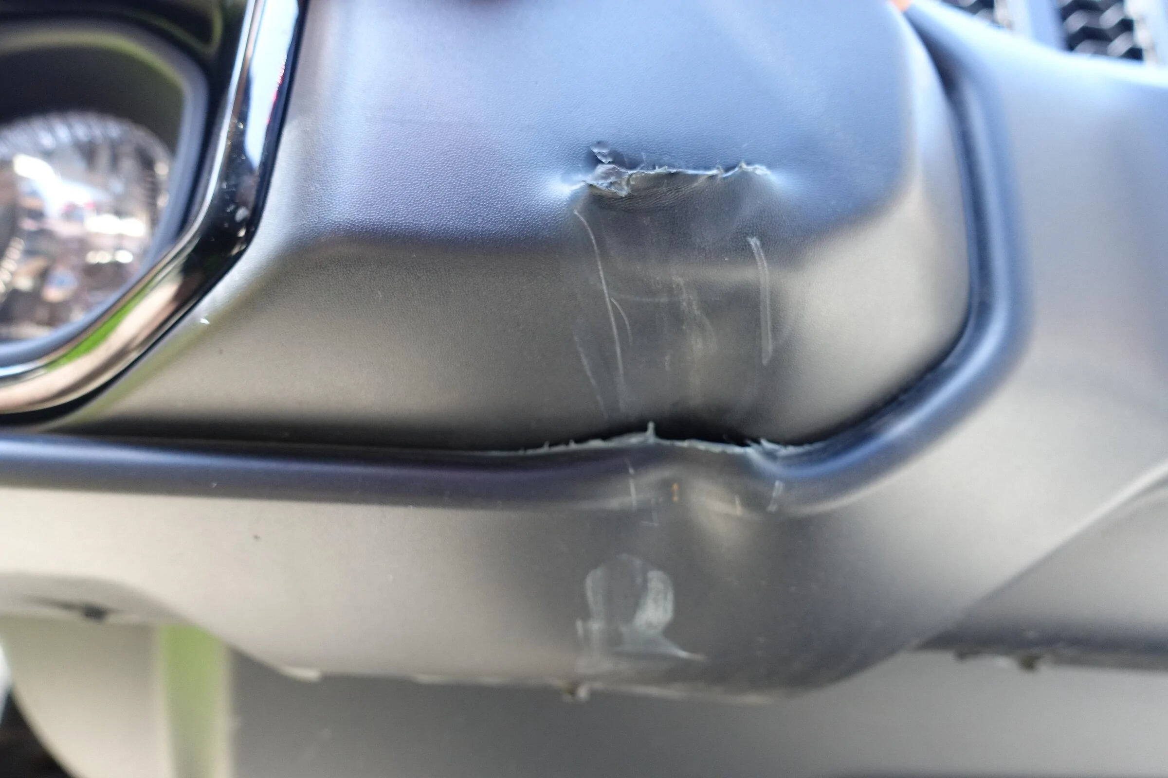 Jeep Gladiator In case you're wondering what the damage of a hitch ball does to a bumper at <5 MPH DSC06410