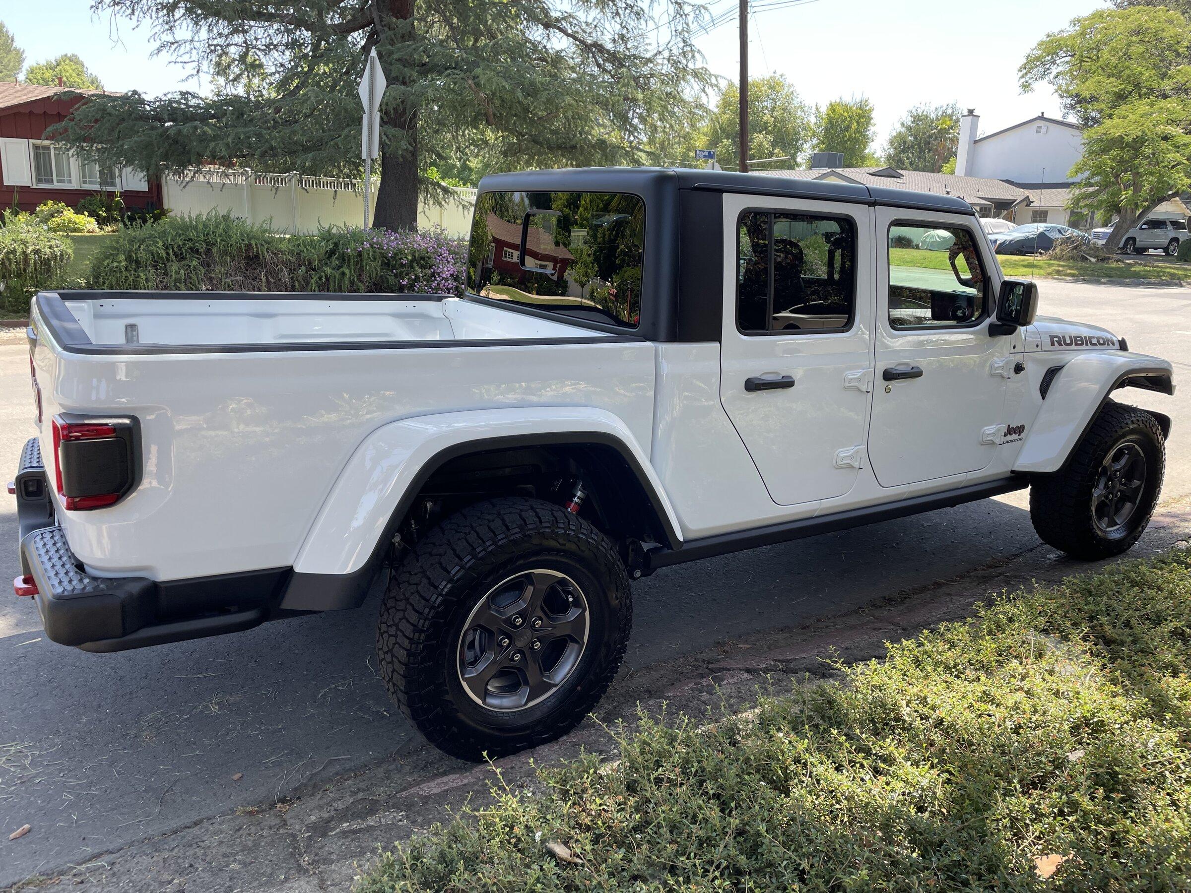Jeep Gladiator New member with a new buddy D03A15F0-1890-4E6F-B1CA-CEDF64DC8414