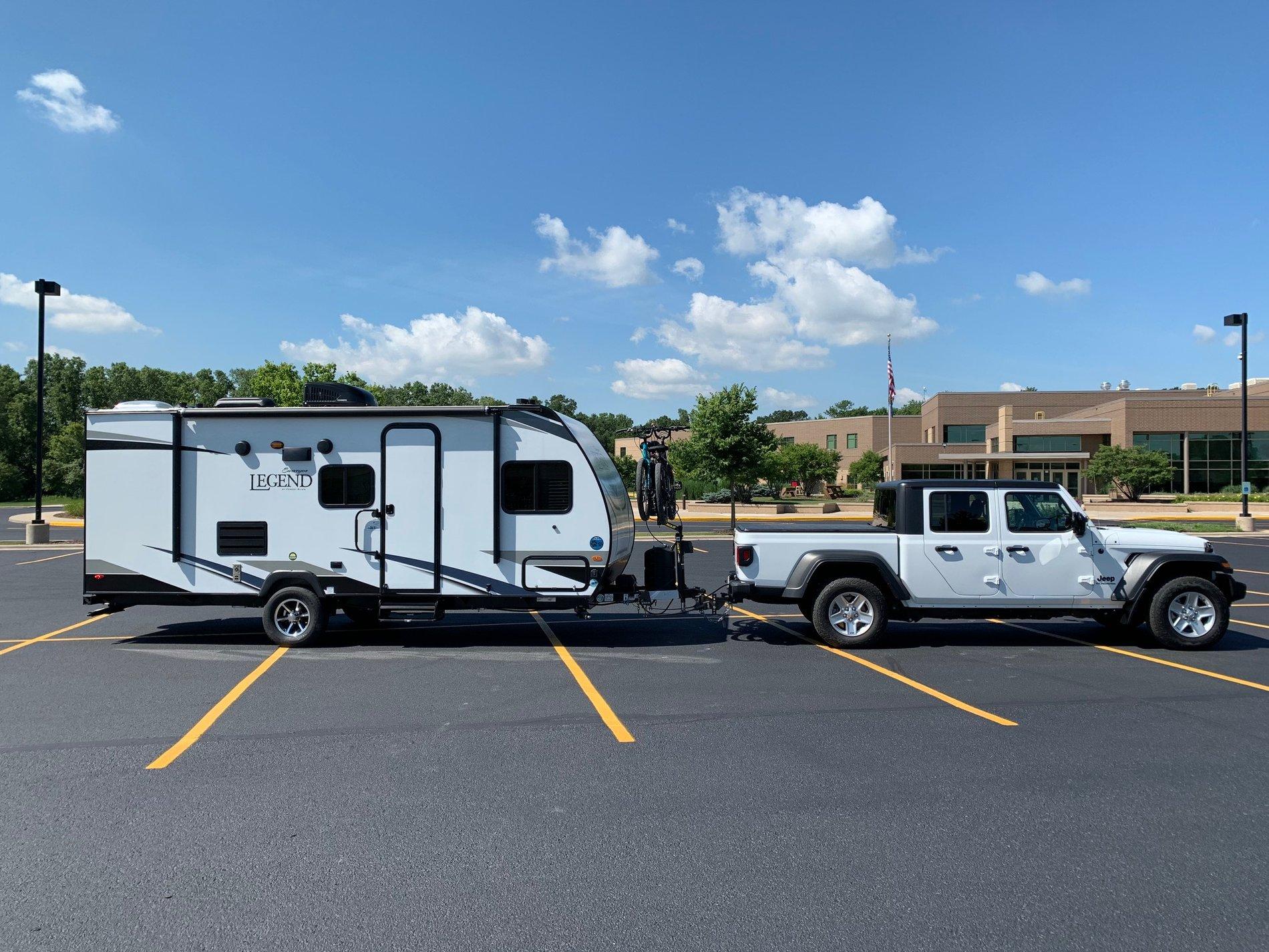 Jeep Gladiator "Max" towing our camper Jeep in parking lot 2019-07-28