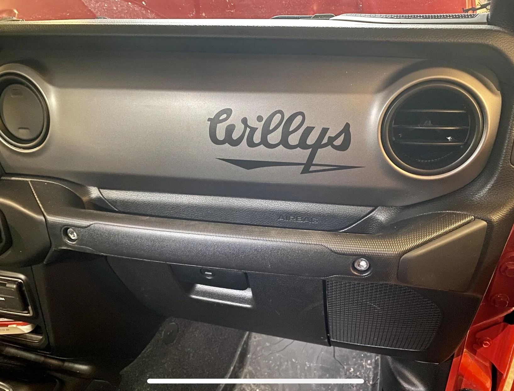 Jeep Gladiator What are people doing with the big blank dash area in front of the passenger? 715A740C-08A4-481F-B6BD-D89DA7185B84