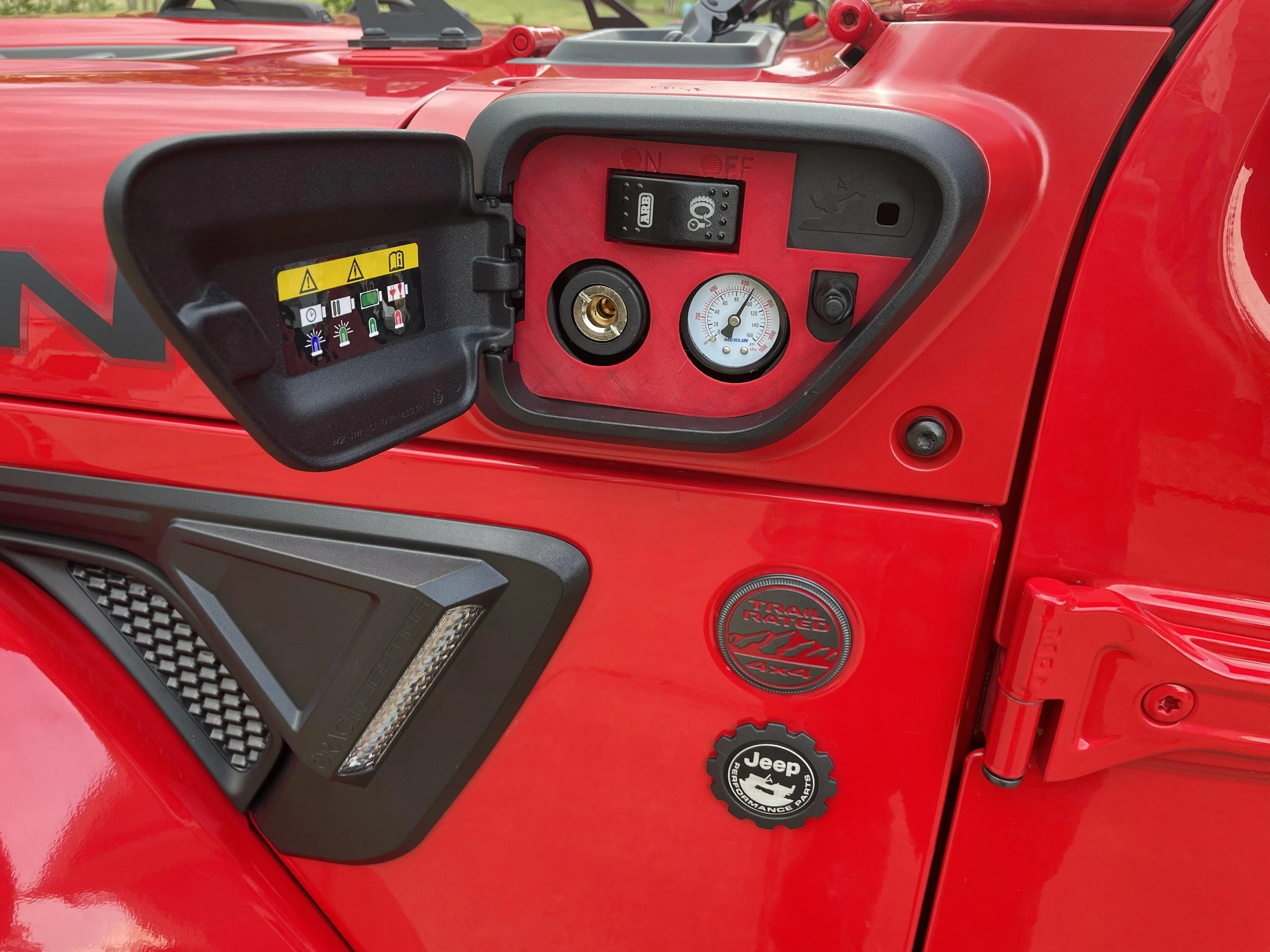 Jeep Gladiator Wrangler 4XE charge port cowl repurposed for ARB on-board air connection F7F78FAB-1196-4E08-9E08-F8BB4D9D83F2