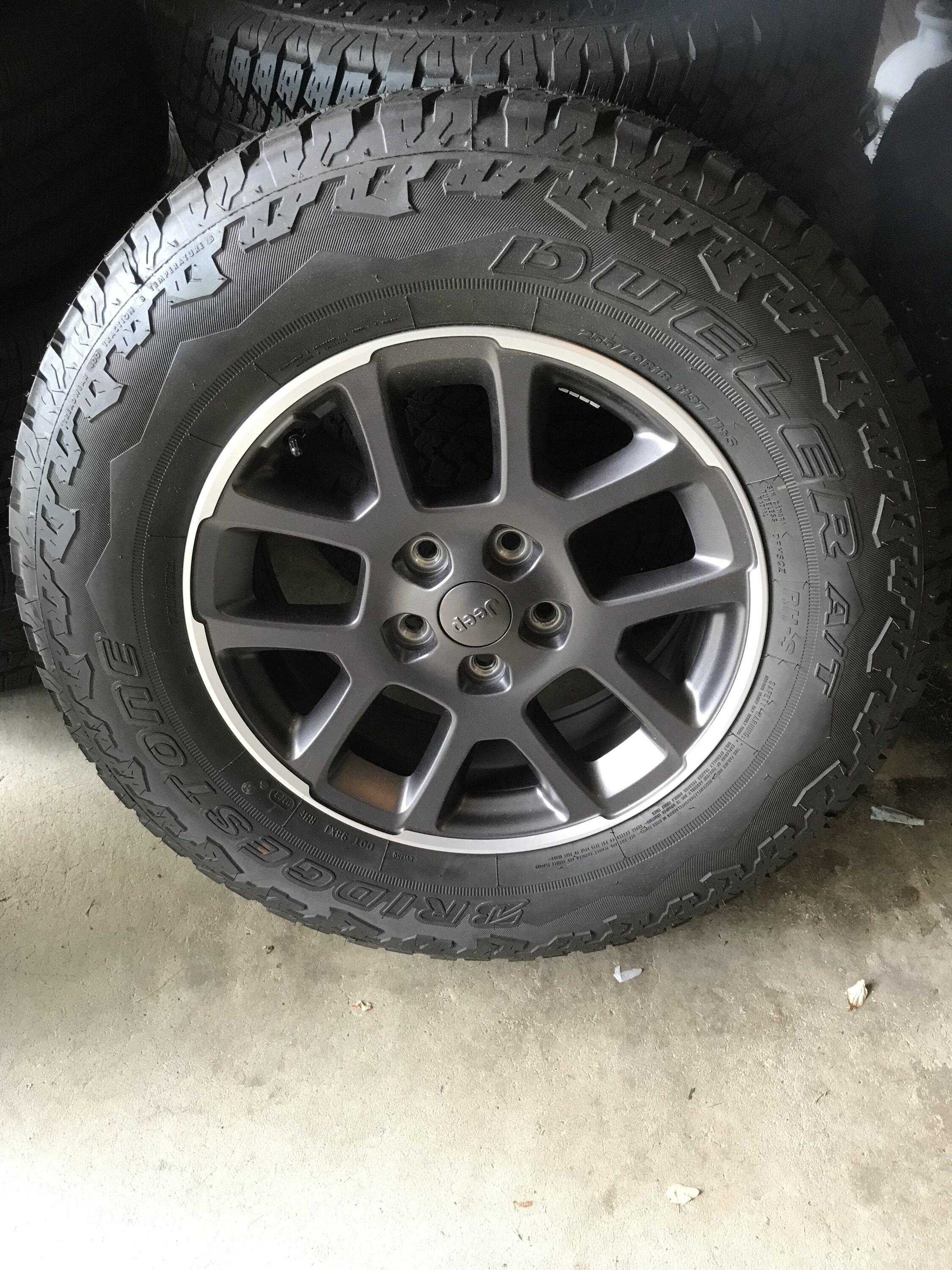 Jeep Gladiator 5 Bridgestone Dueler 255/70R18 tires on Gladiator wheels. 800$ A915424F-26EF-46CD-A671-C33F34079E38