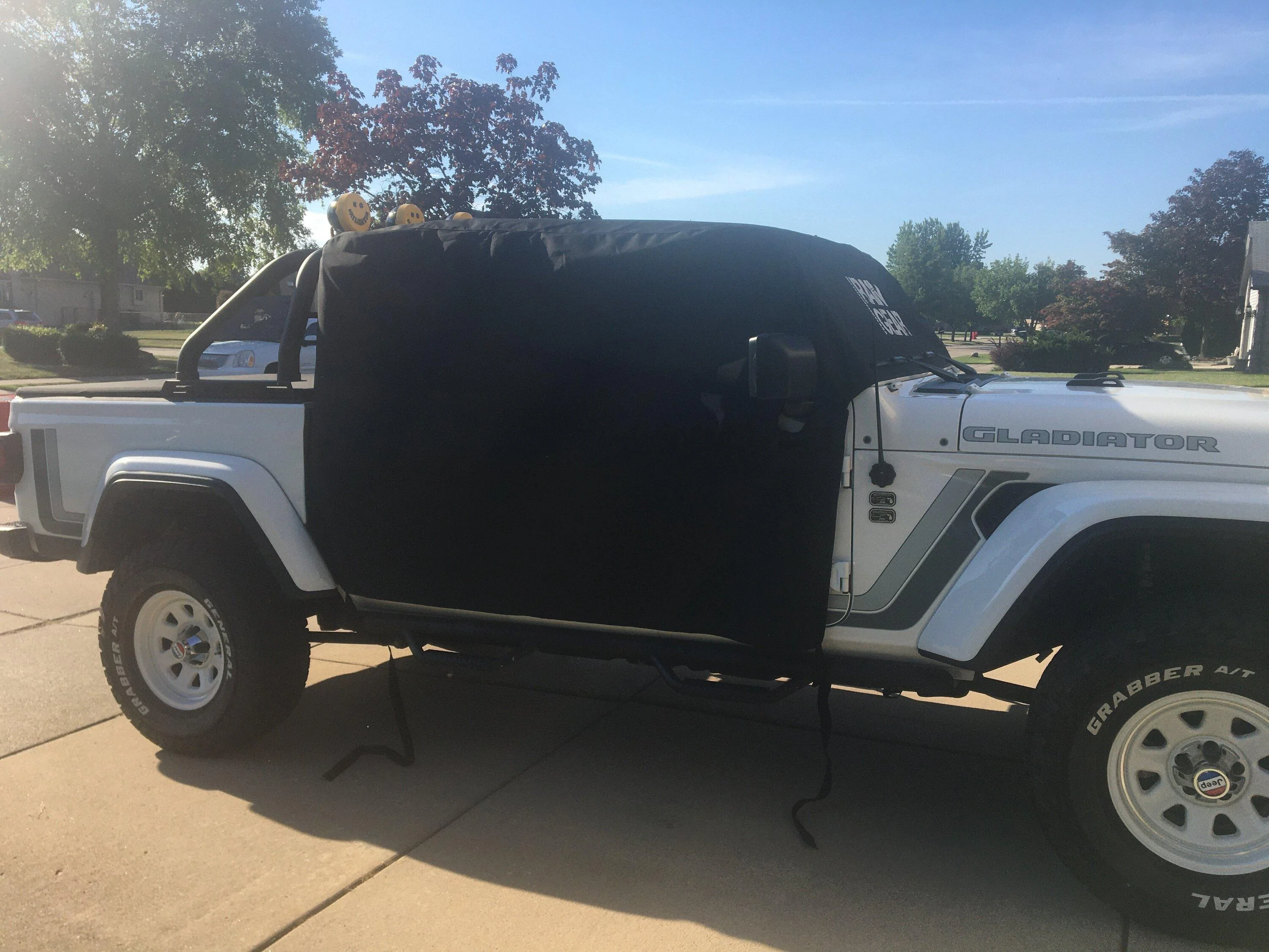 Jeep Gladiator How do you protect your JT when topless? Rain gear cab cover