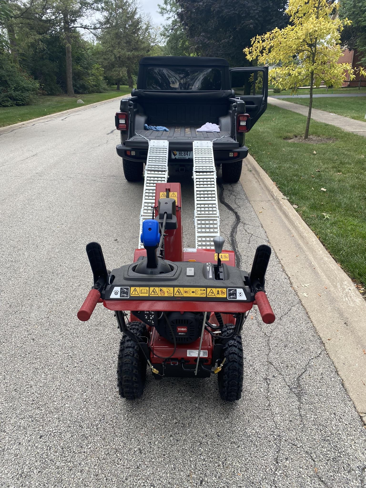 Jeep Gladiator How to load a two-stage snow thrower using bed ramps 419D3FCC-043D-4BD4-9C19-572457CBACA5