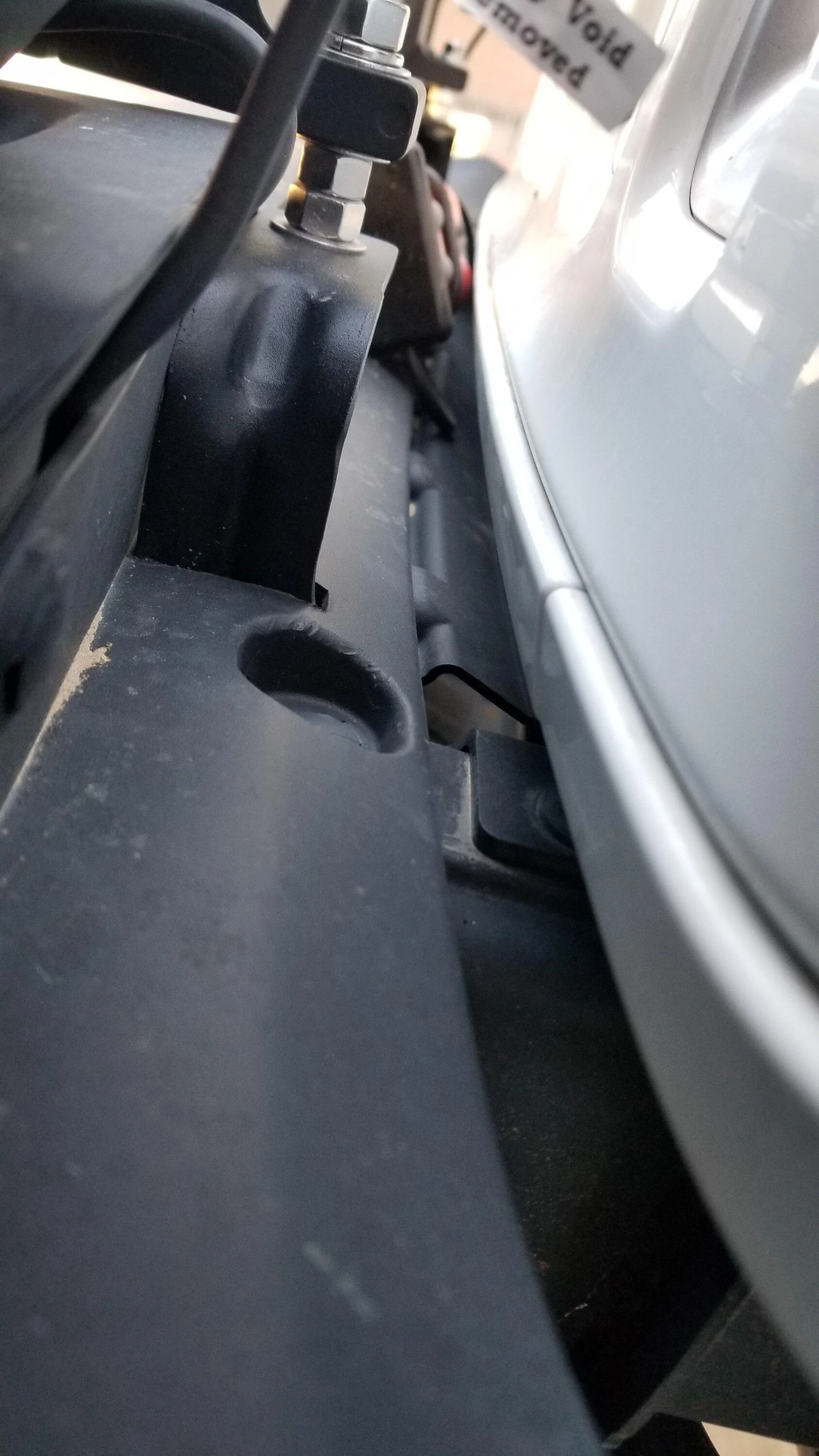 Jeep Gladiator Are front frame horns boxed or do I have access to this trim hole? ( after front bumper and mounts removal)? 20210214_162343