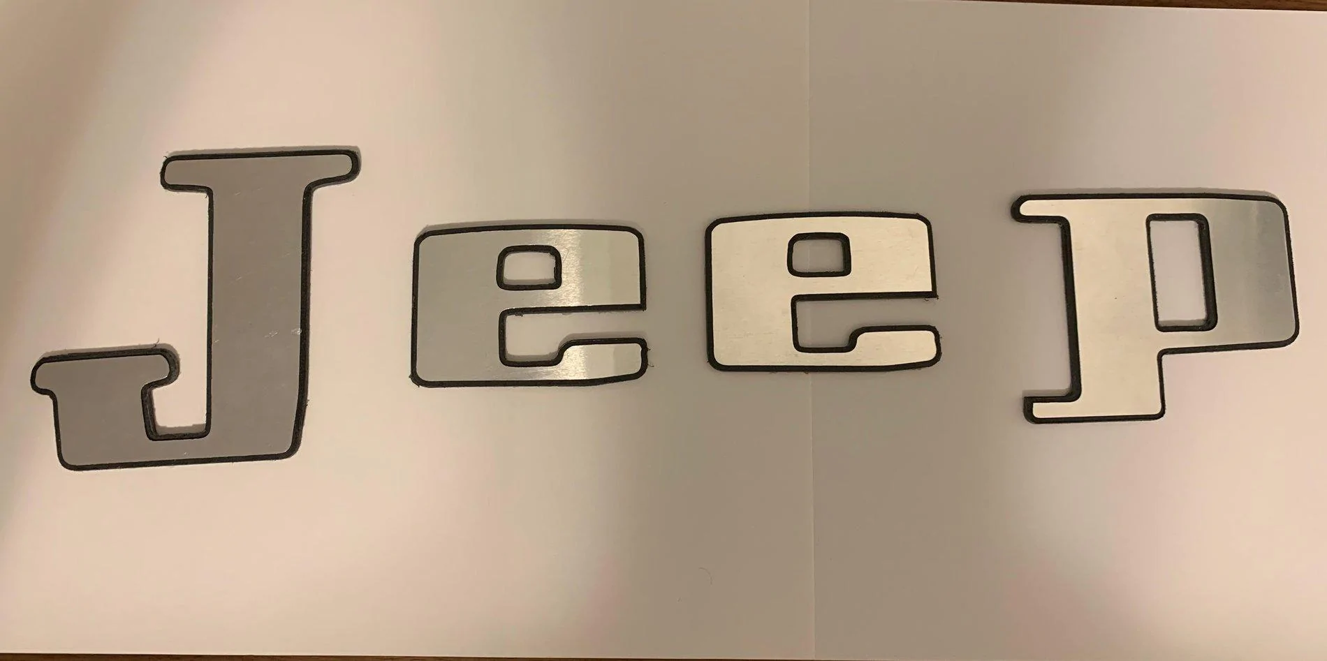 Jeep Gladiator "JEEP" tailgate badge mods? IMG_1009