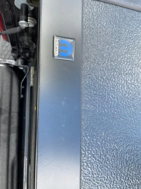 Jeep Gladiator Mopar Tri-Fold Tonneau cover Mopar Badg
