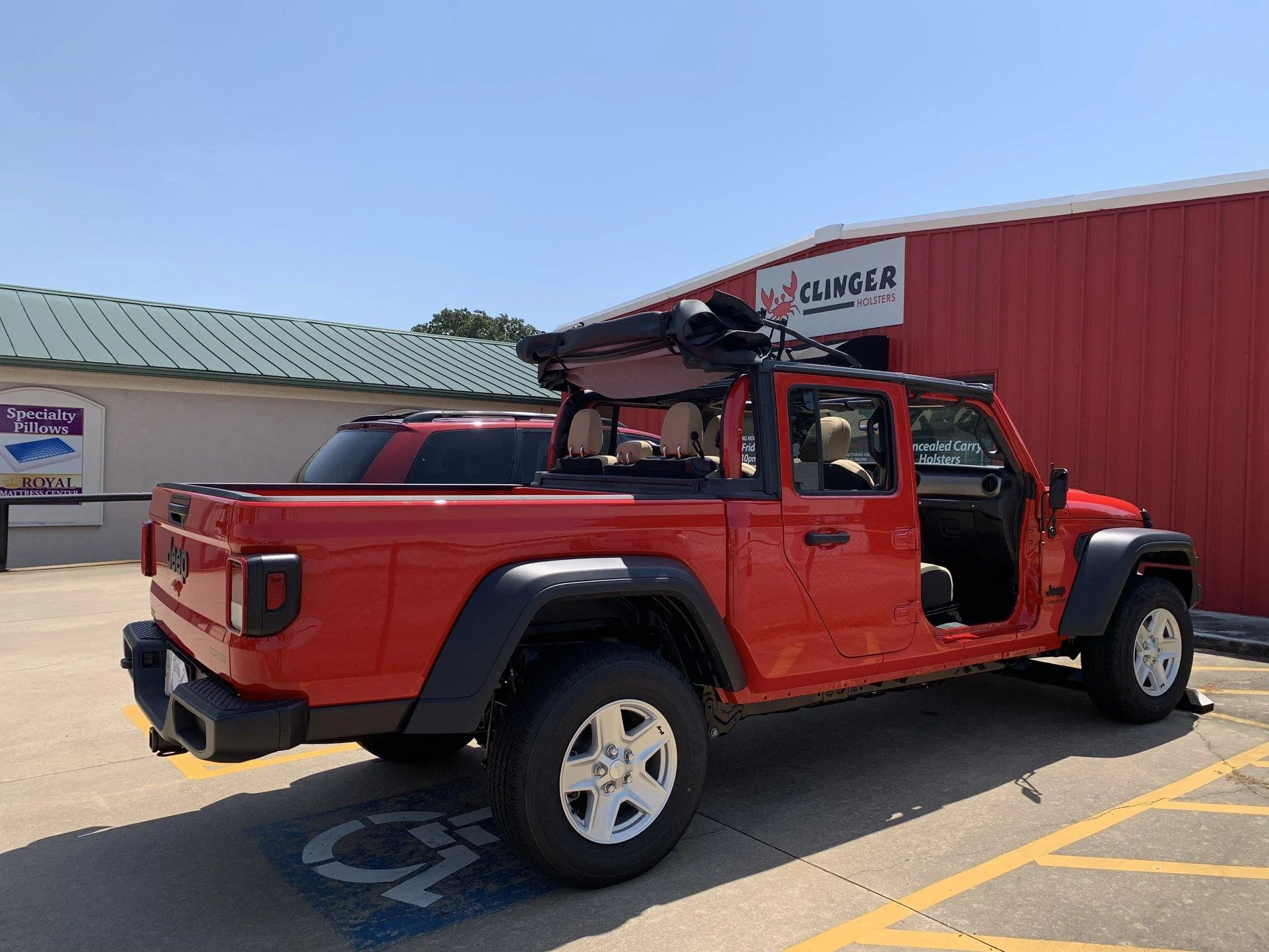 Jeep Gladiator Pics with the soft top down (not off)? D67567B3-F8EA-4A24-A40C-CB00B2B9F84A