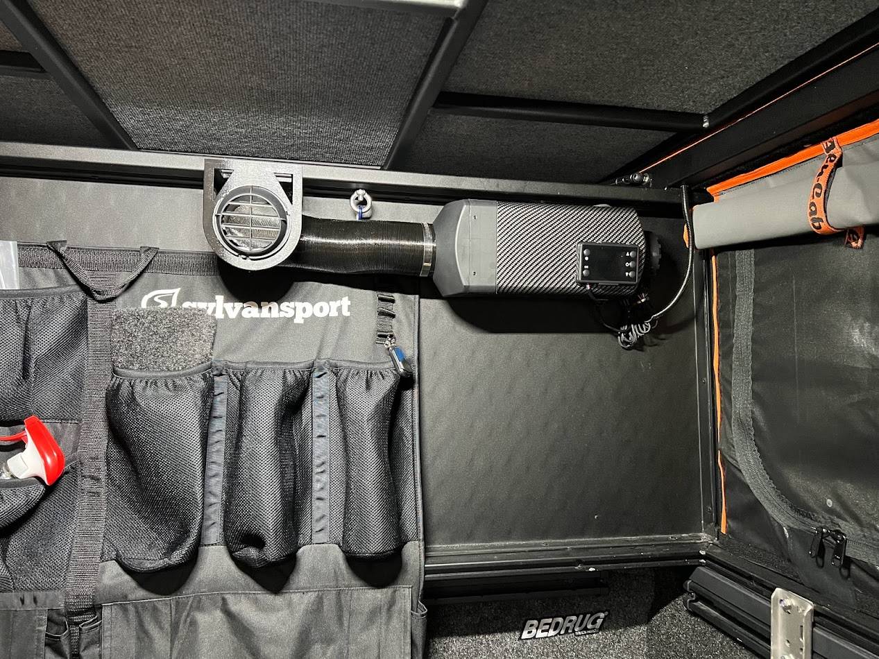 Jeep Gladiator Alu-Cab Canopy Camper Roll Call installed heater
