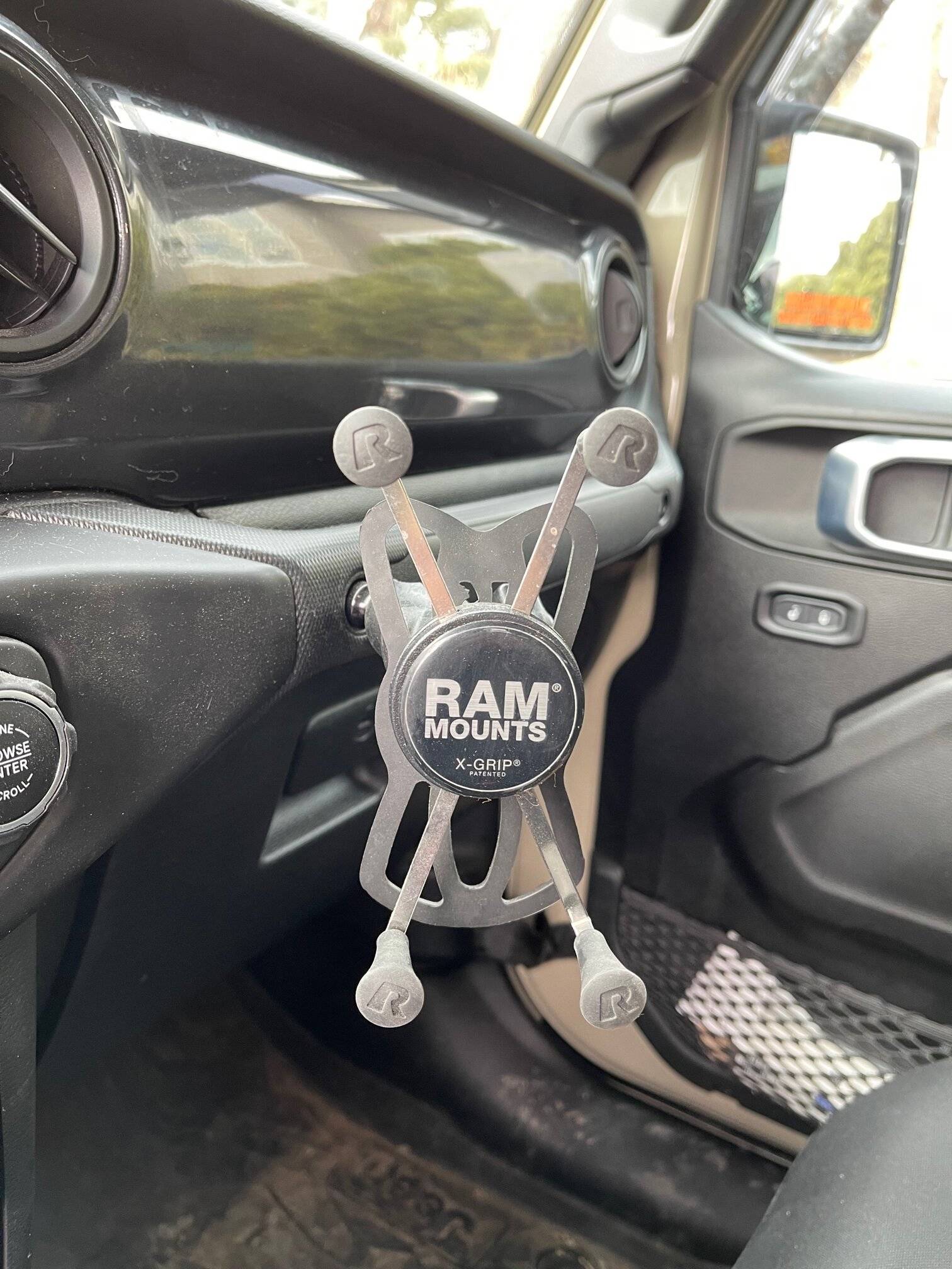 Jeep Gladiator Looking for a unicorn phone mount. Any suggestions? IMG_4545
