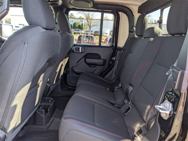 Jeep Gladiator 2023 Gladiator Rubicon without plastic molle panel behind driver and passenger seat? 3513dd1f8624a087e94f107a7ac1431c