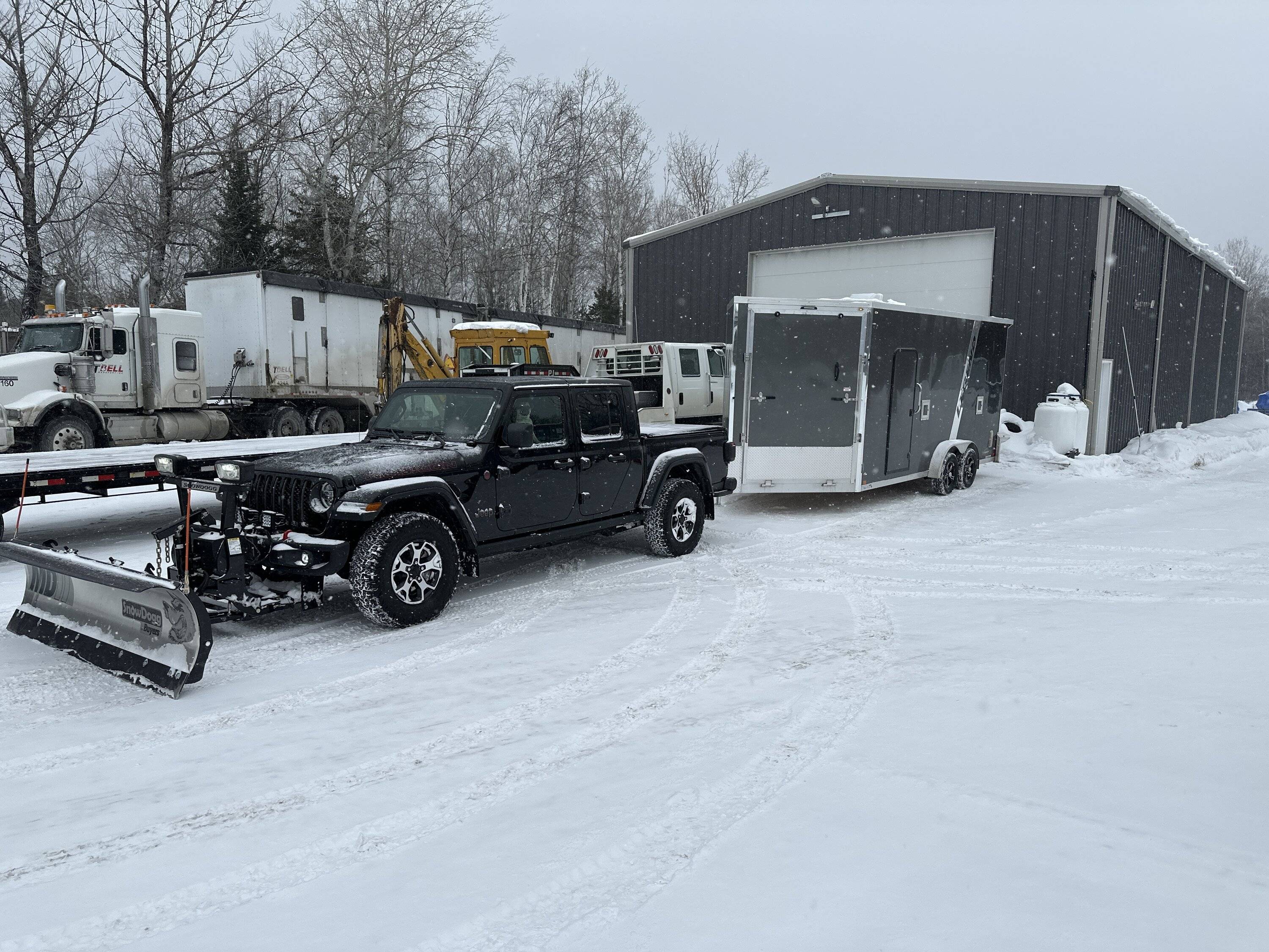 Jeep Gladiator 7x23 enclosed inline snowmobile trailer what do you think image