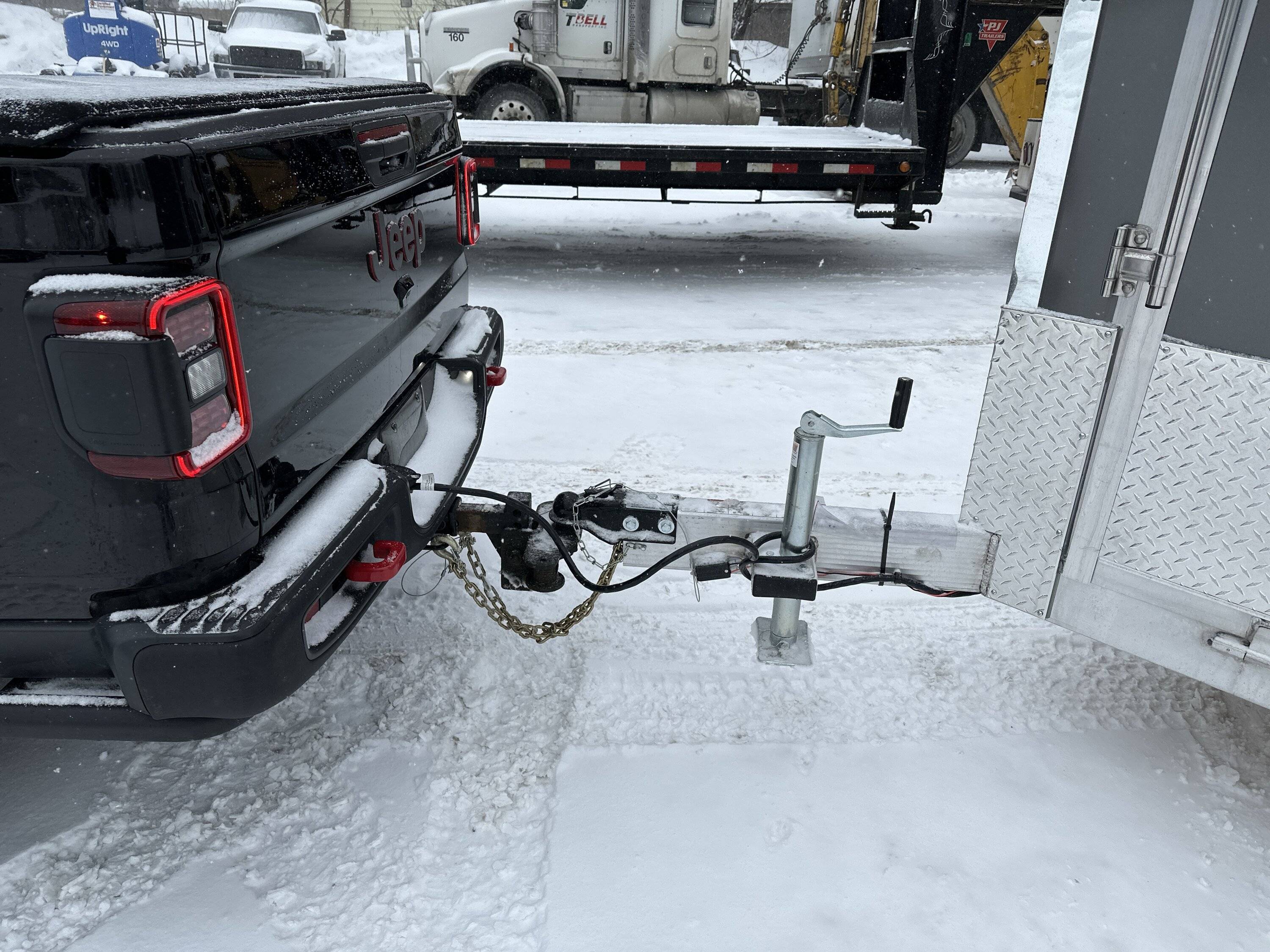 Jeep Gladiator 7x23 enclosed inline snowmobile trailer what do you think image