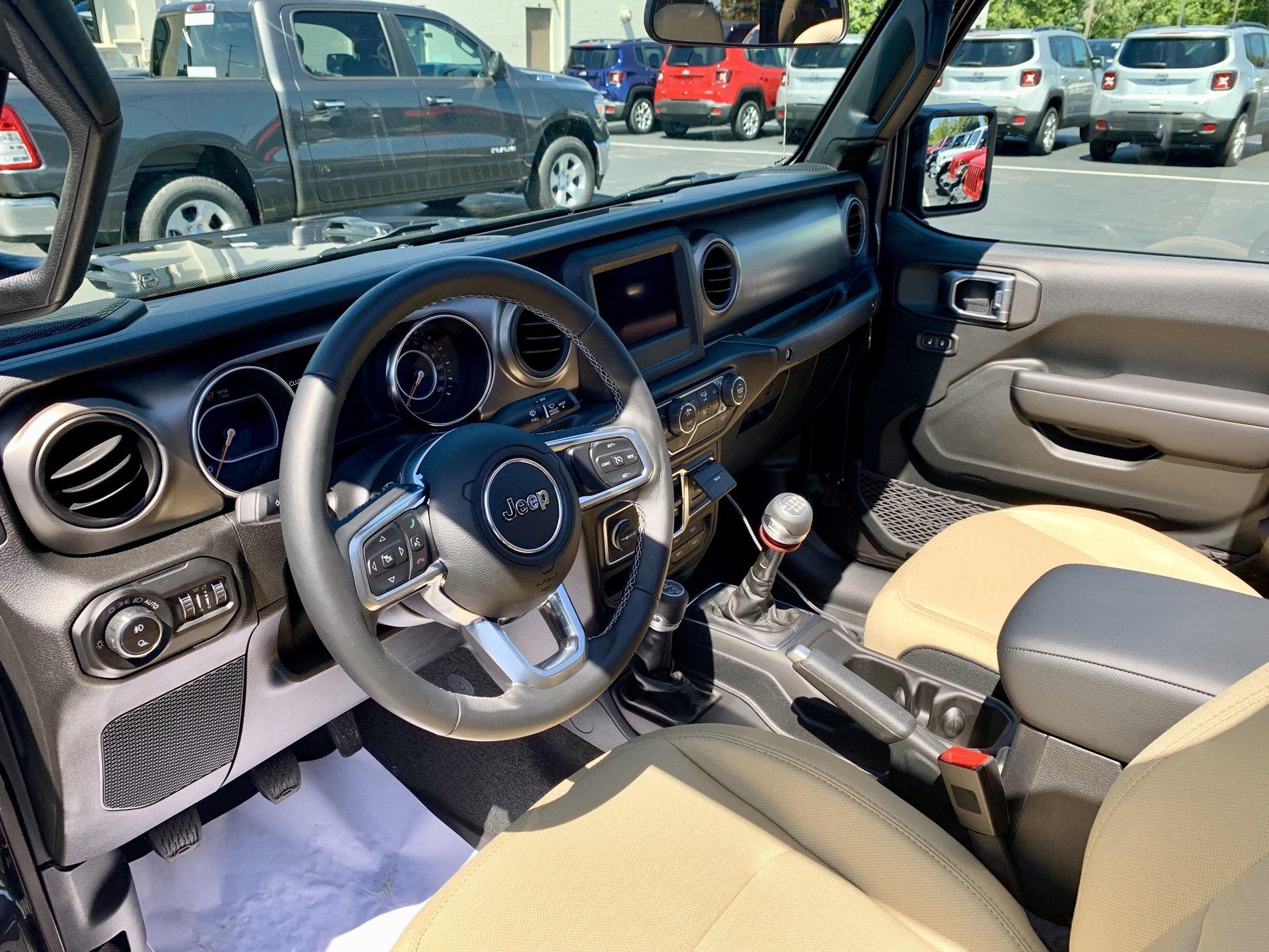 Jeep Gladiator Who Has The Tan Cloth Interior? 0170F5F8-F97F-4266-88F5-40D9052CD968
