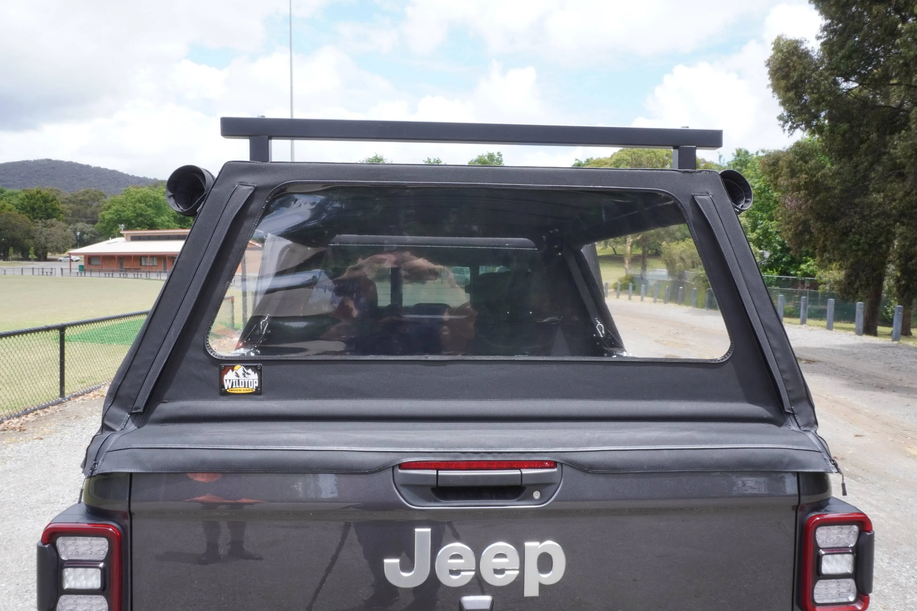Jeep Gladiator Anyone using this soft cap (from wild-top.com)? Rear View - Clear Windo