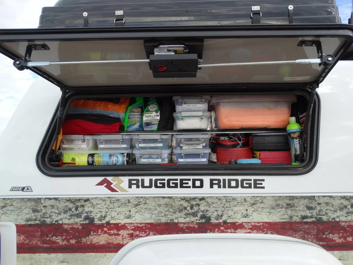 Jeep Gladiator A.R.E. CX HD Topper - Less than 2 years old  HALF Price ! The Passenger side Tool Box of the ARE Topper has recovery gear and more supplies such as Wag