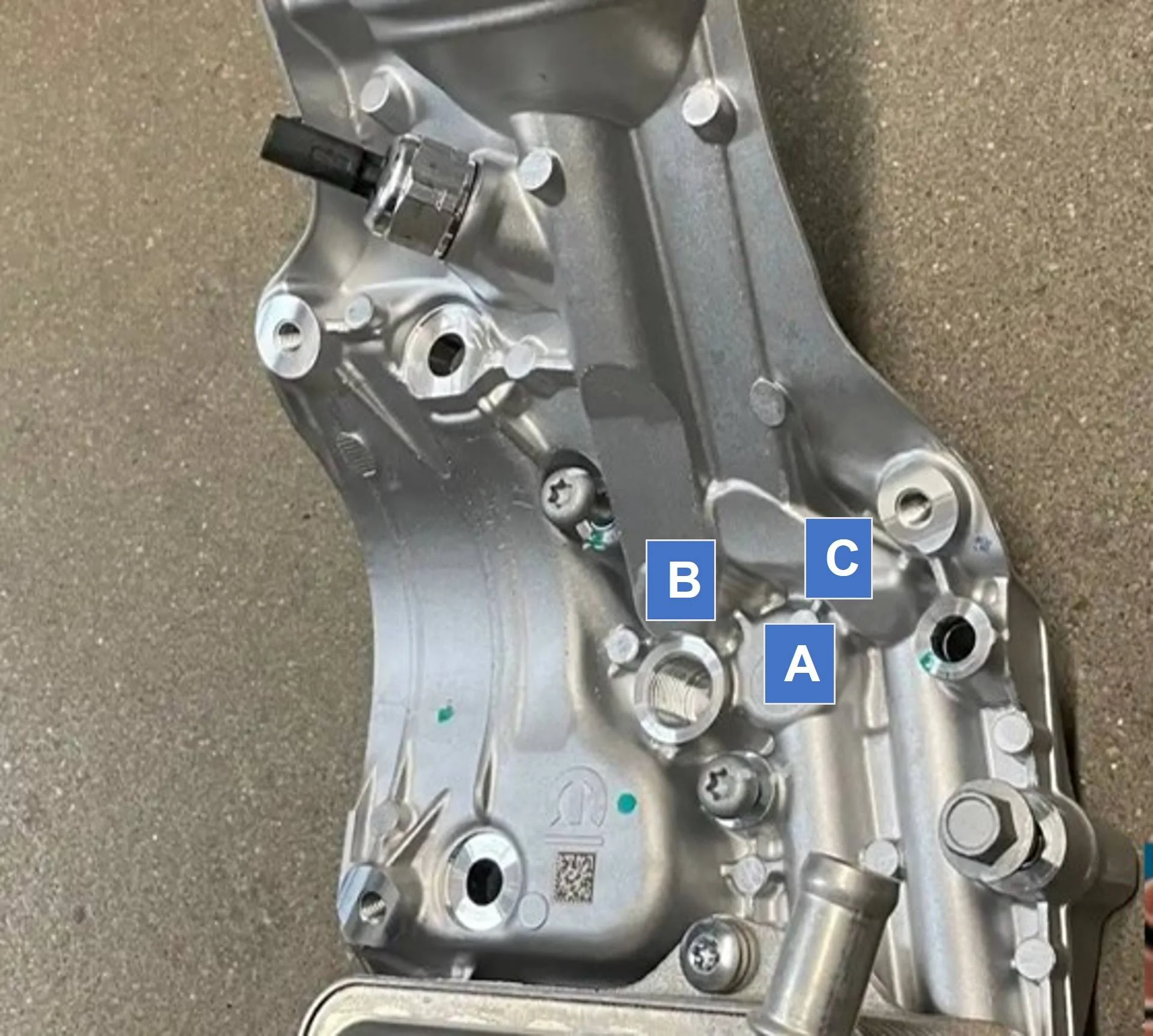 Jeep Gladiator Anatomy of the oil cooler and filter housing. front side side view oil filter Assy
