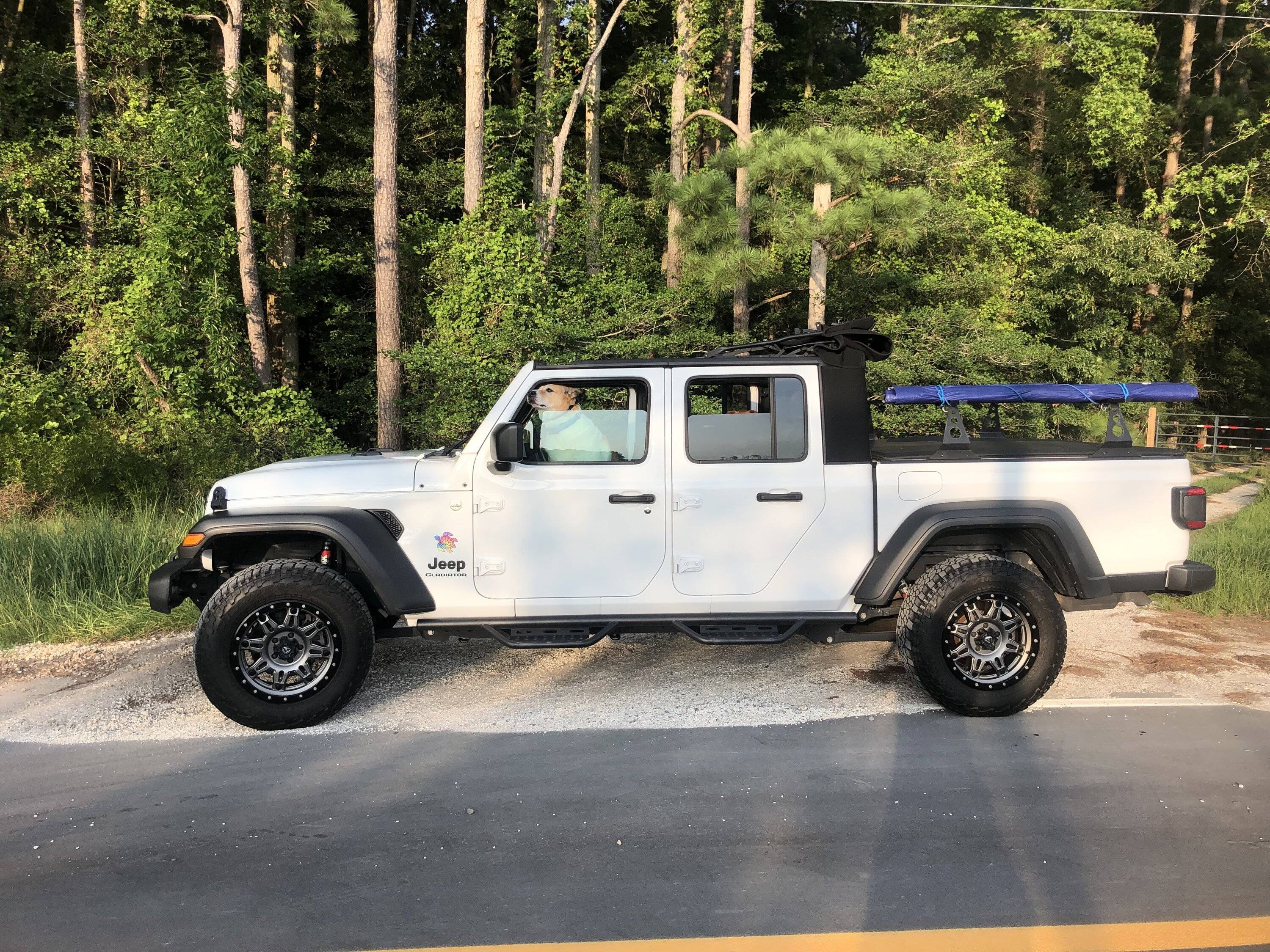 Jeep Gladiator Using an Xtrusion overland rack as a base for DIY enclosed topper... or just go Alu-Cab Contour Canopy DJ side shot closed awnin