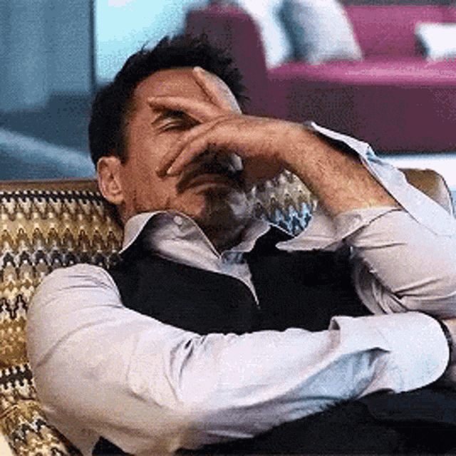 facepalm-robert-downey-jr.gif