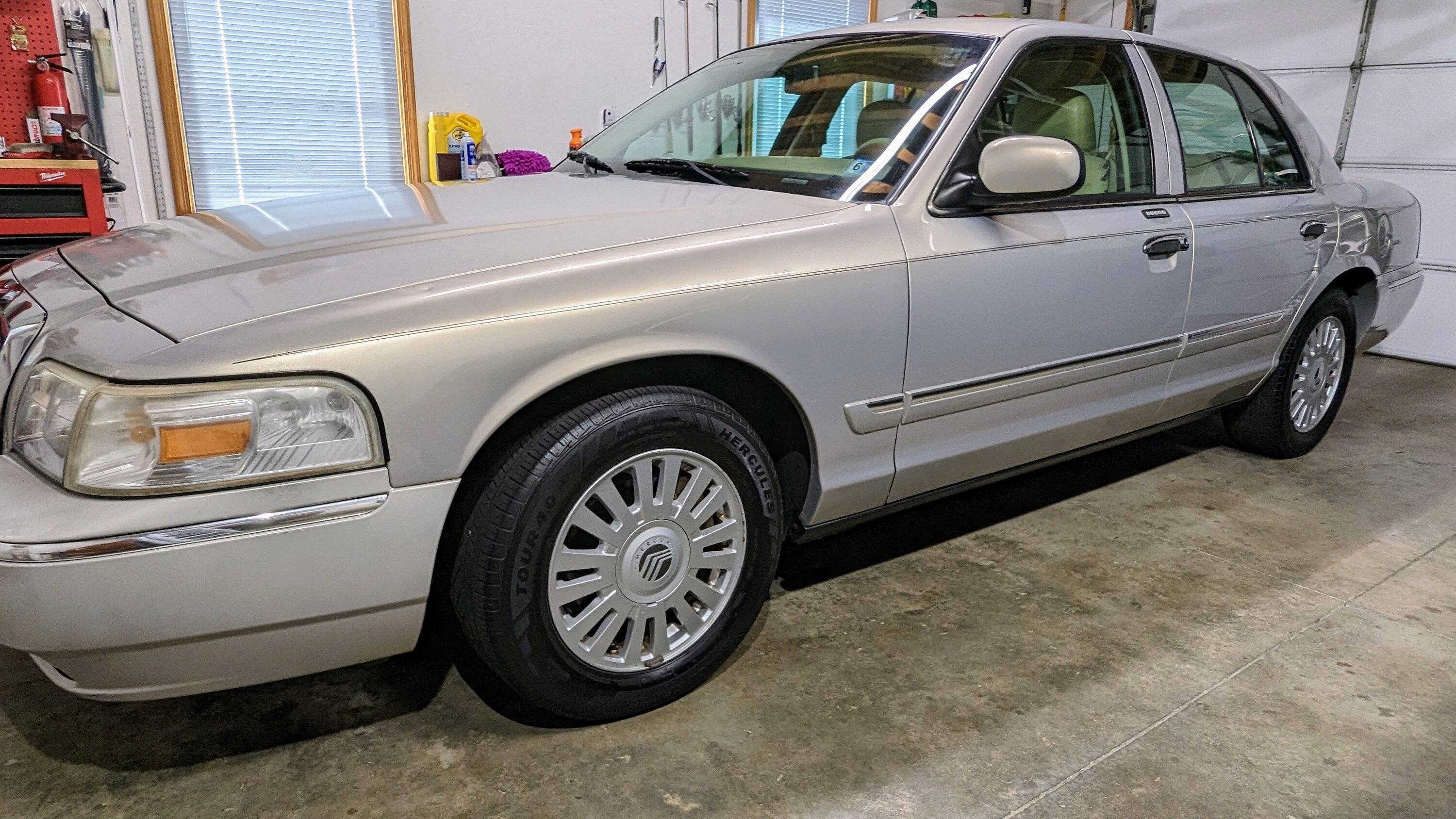 Jeep Gladiator Dad's '07 Grand Marquis PXL_20230419_161415032~2