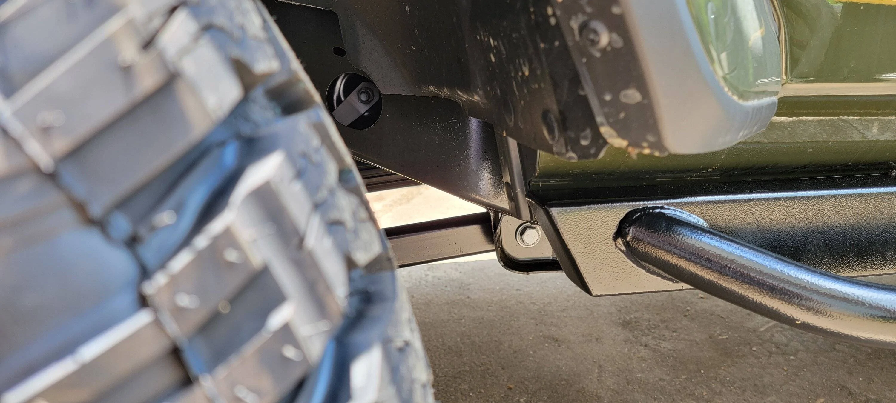 Jeep Gladiator Rock Hard VS White Knuckle Sliders FrontSideClos