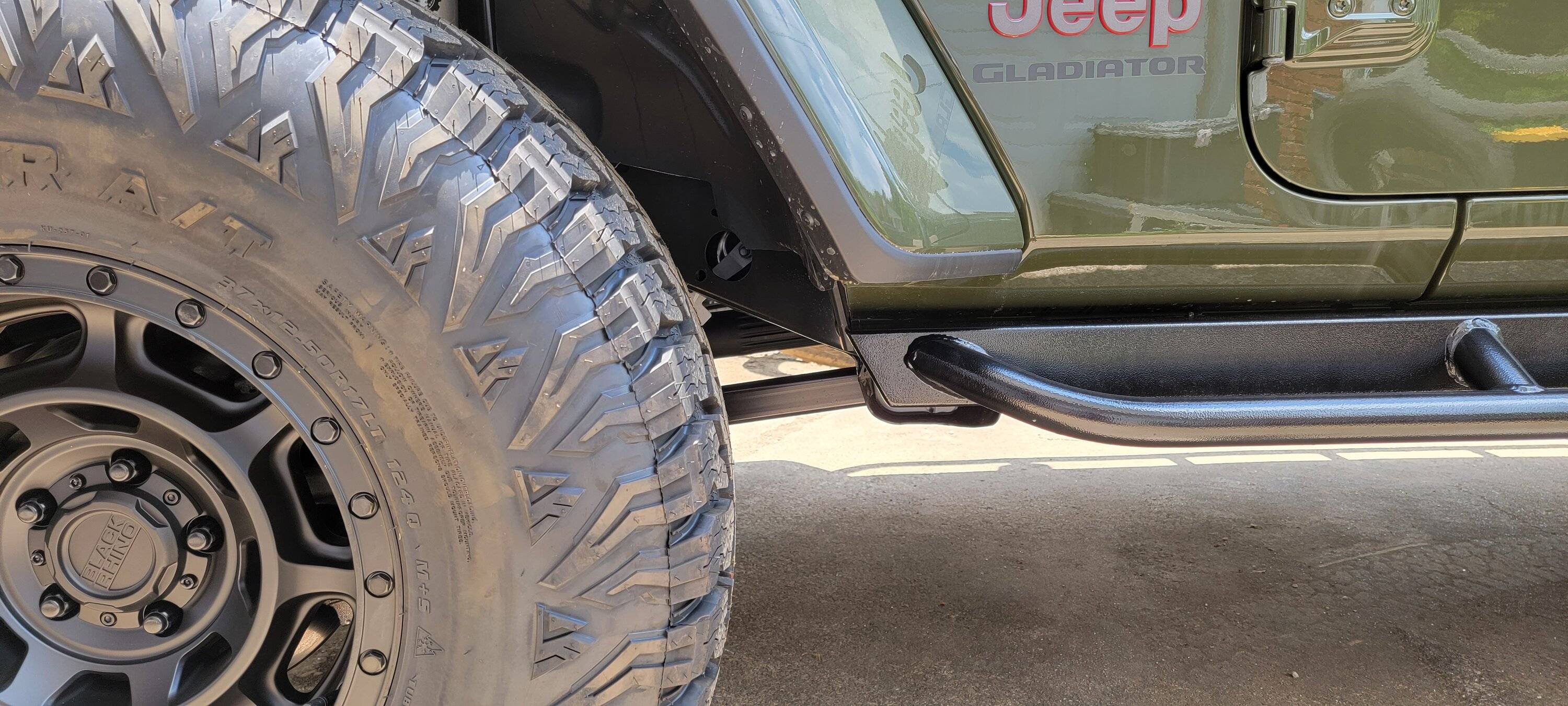 Jeep Gladiator Rock Hard VS White Knuckle Sliders FrontSideFar