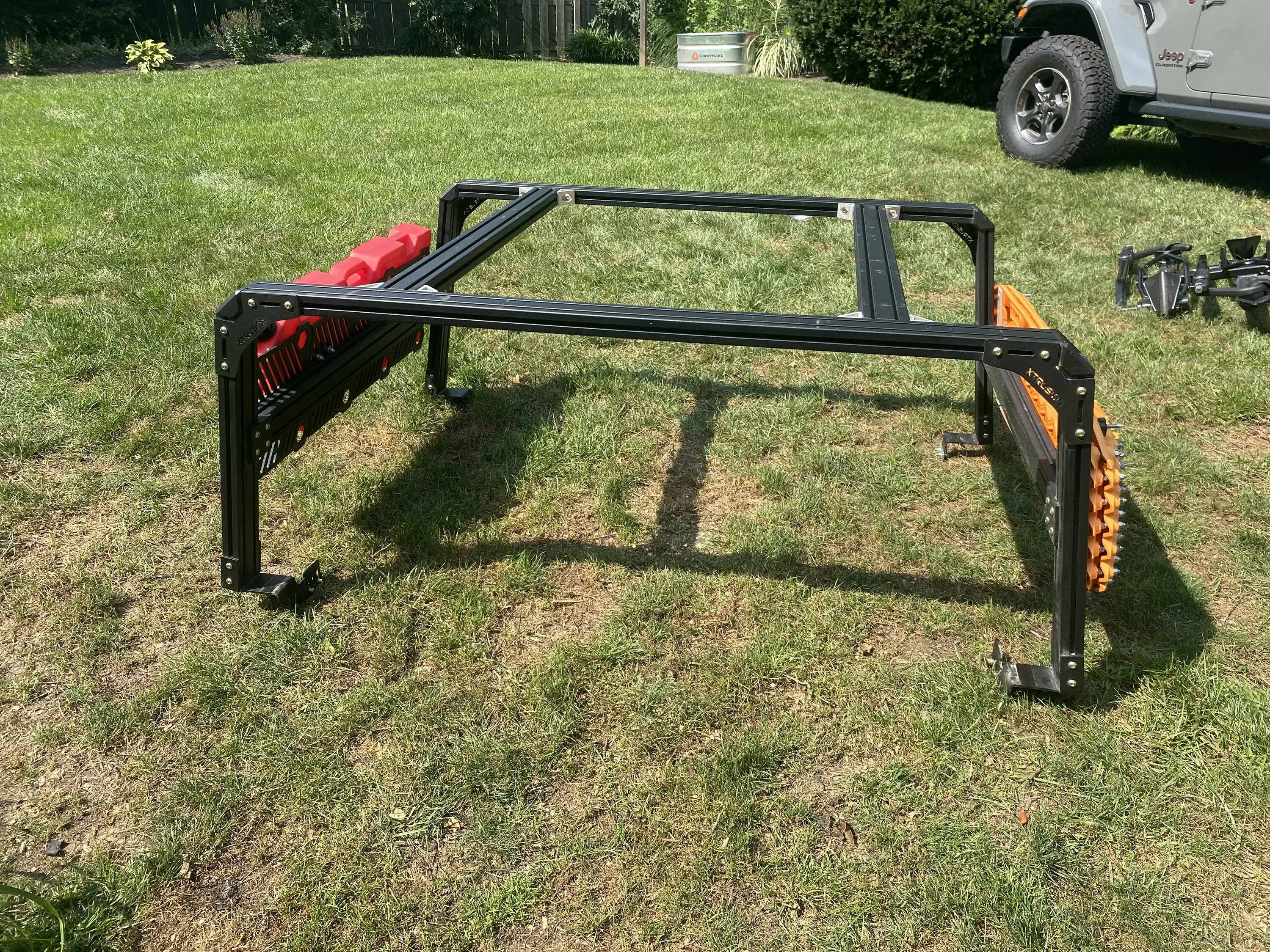 Jeep Gladiator Xtrusion Overland XTR1 Bed Rack with Actiontrax and Rotopax fuel can 619EC061-C303-48D4-AF3B-97C50EC27988
