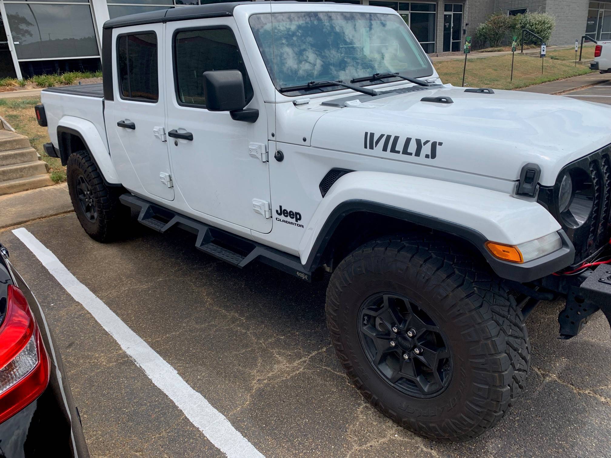 Jeep Gladiator Lets see those Sport S Gladiators with 35" tires and wheels !! Willy 3