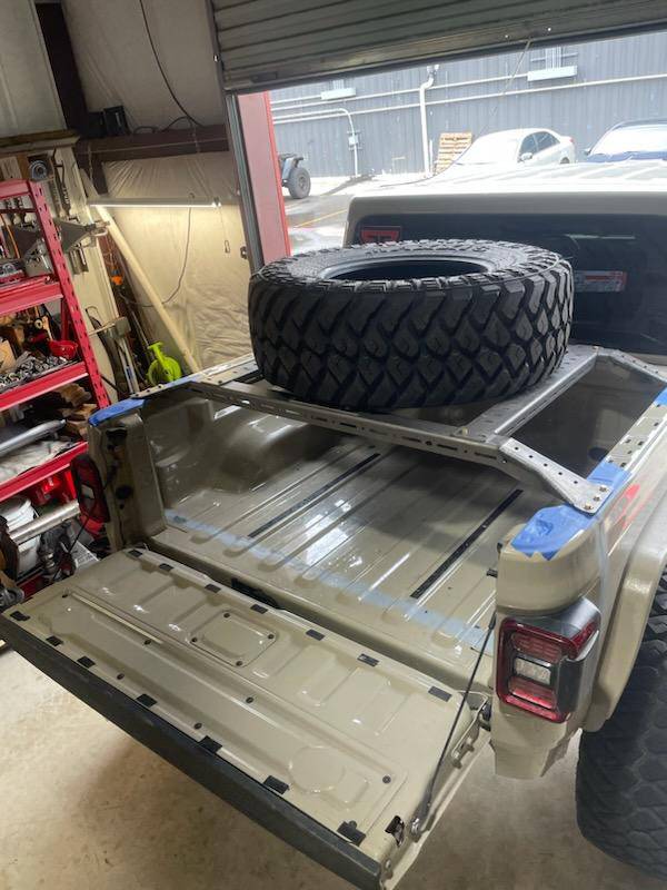 Jeep Gladiator Simple crossbars for spare tire? A887C106-37A3-4974-86AD-8AF58E29351D