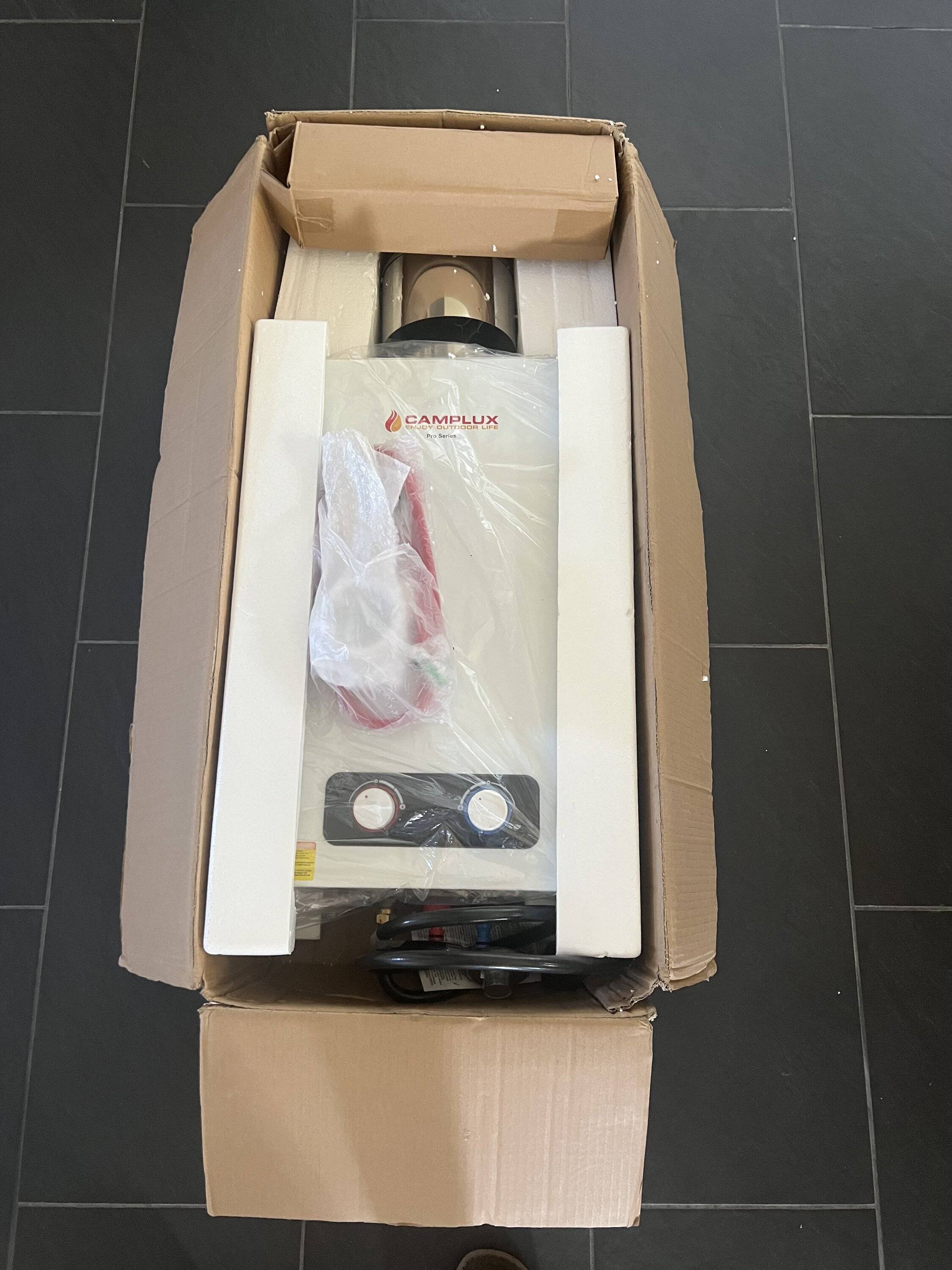 Jeep Gladiator Camplux 2.64gpm portable shower with rain cap IMG_0020