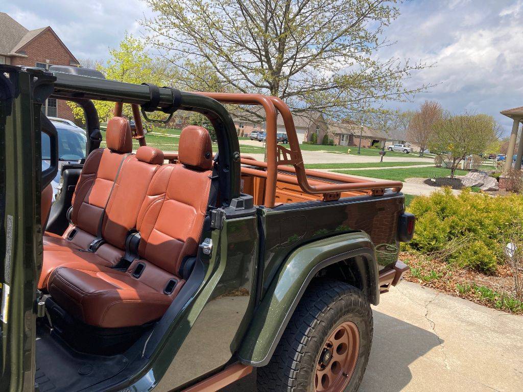 Jeep Gladiator I'm considering a roll bar in the bed. have one? show us! Jeep roll cage side-ish