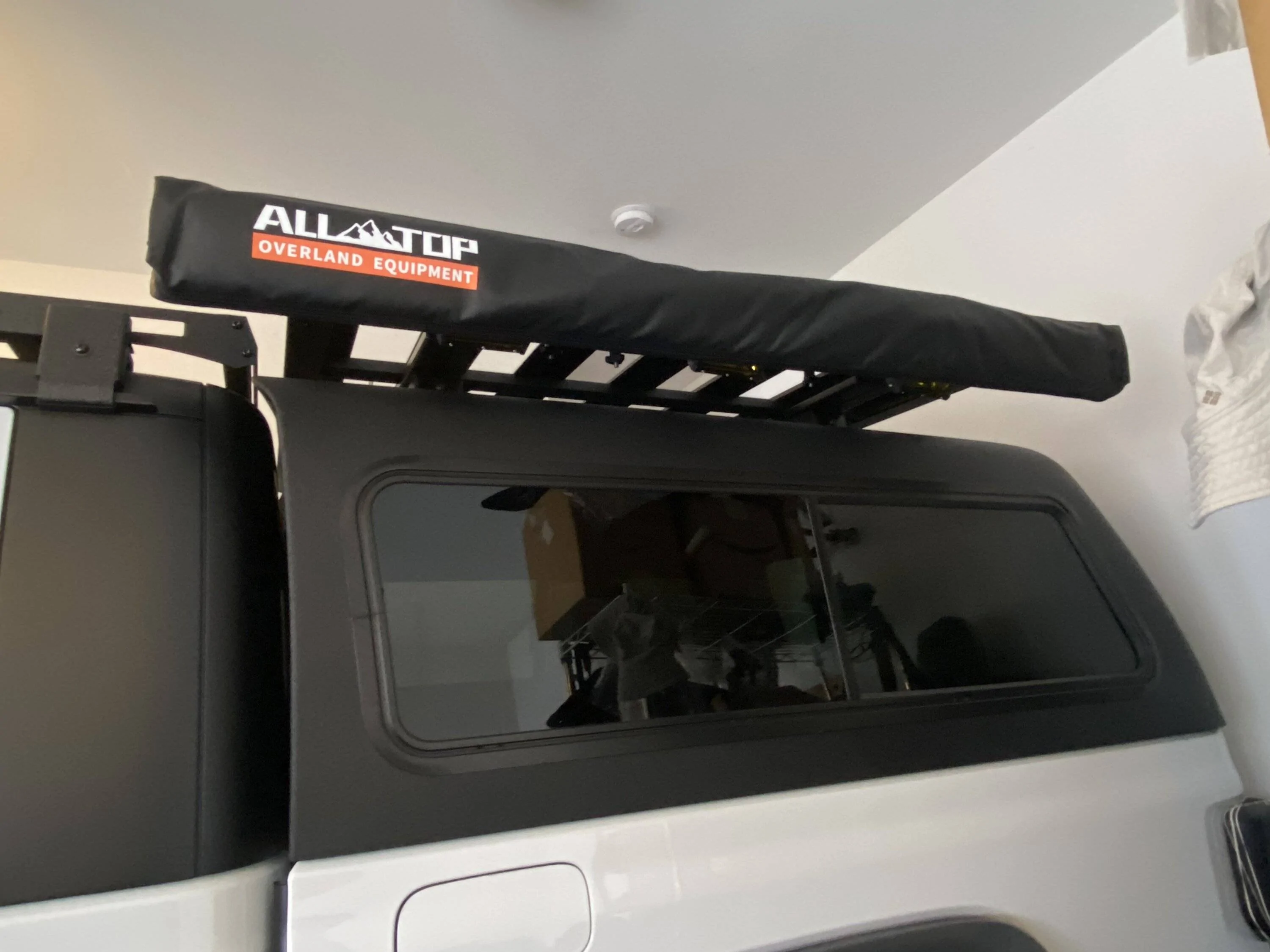 Jeep Gladiator add awning to a ARE camper. IMG_5179