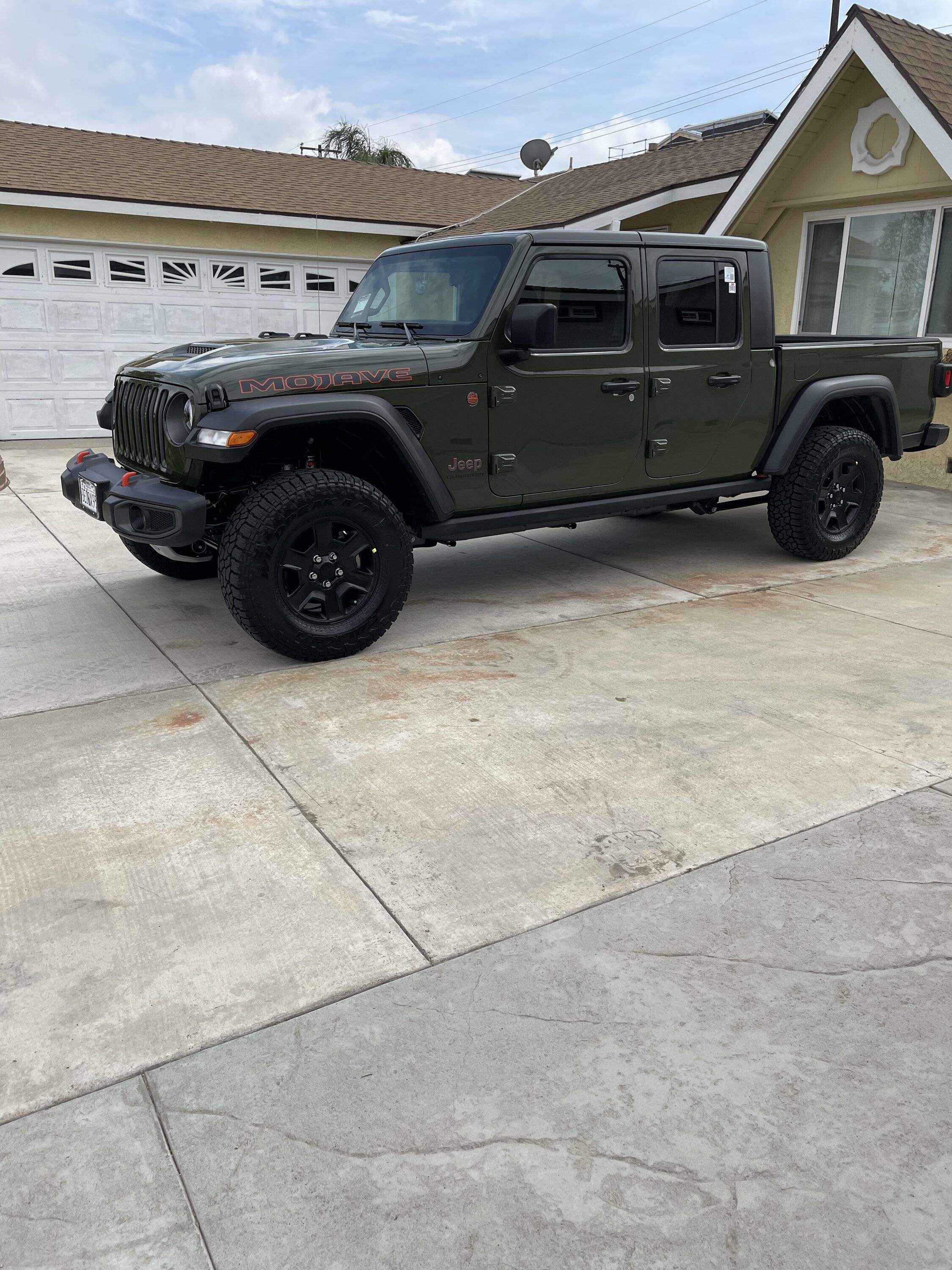 Jeep Gladiator Any former WJ owners want to compare to their JTs?  (build quality, noise, handling, long-term ownership, etc.) 79F62717-04DC-4CC9-B5E5-F51C81EF6668