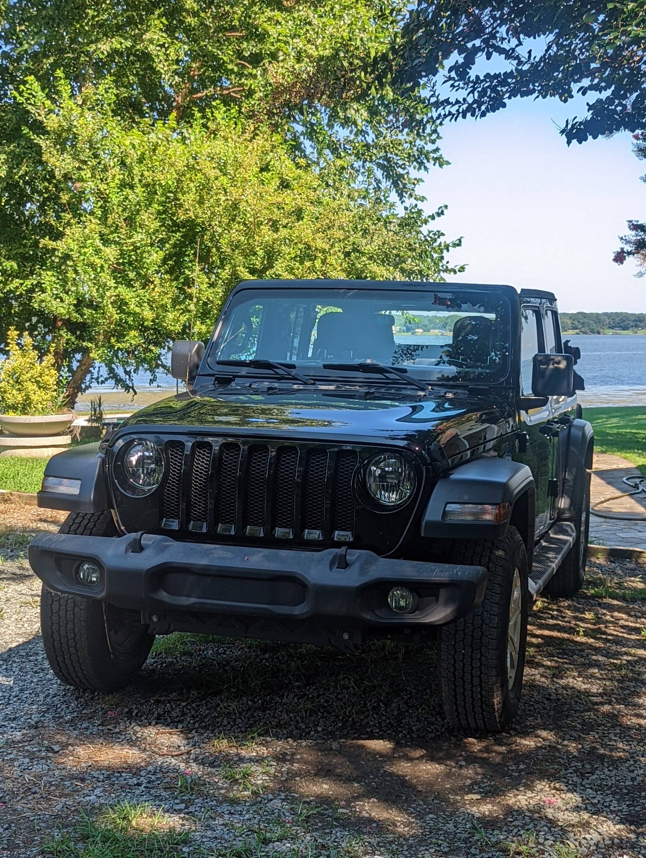 Jeep Gladiator Car and Driver: Would you rather? Gladiator vs GMC Canyon Jeep with top down
