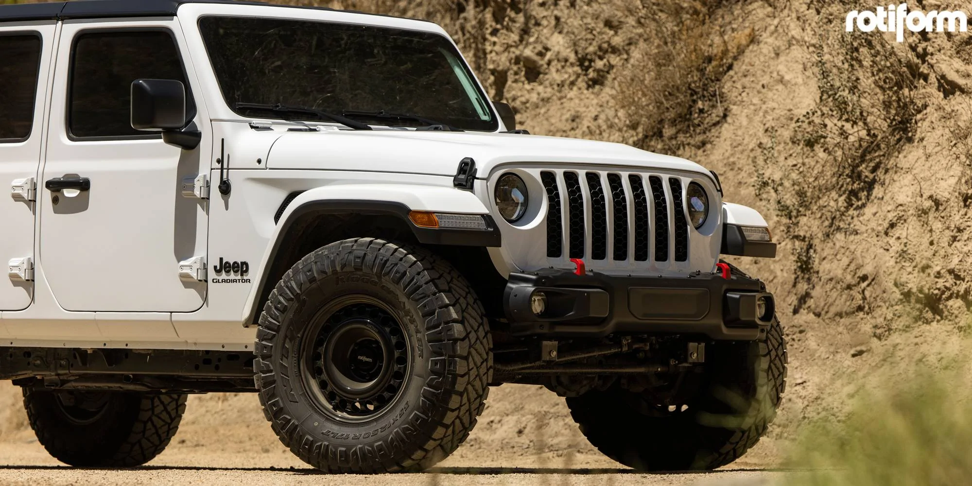 Jeep Gladiator Running OEM 20 hole steelies with 37s 1707751256237