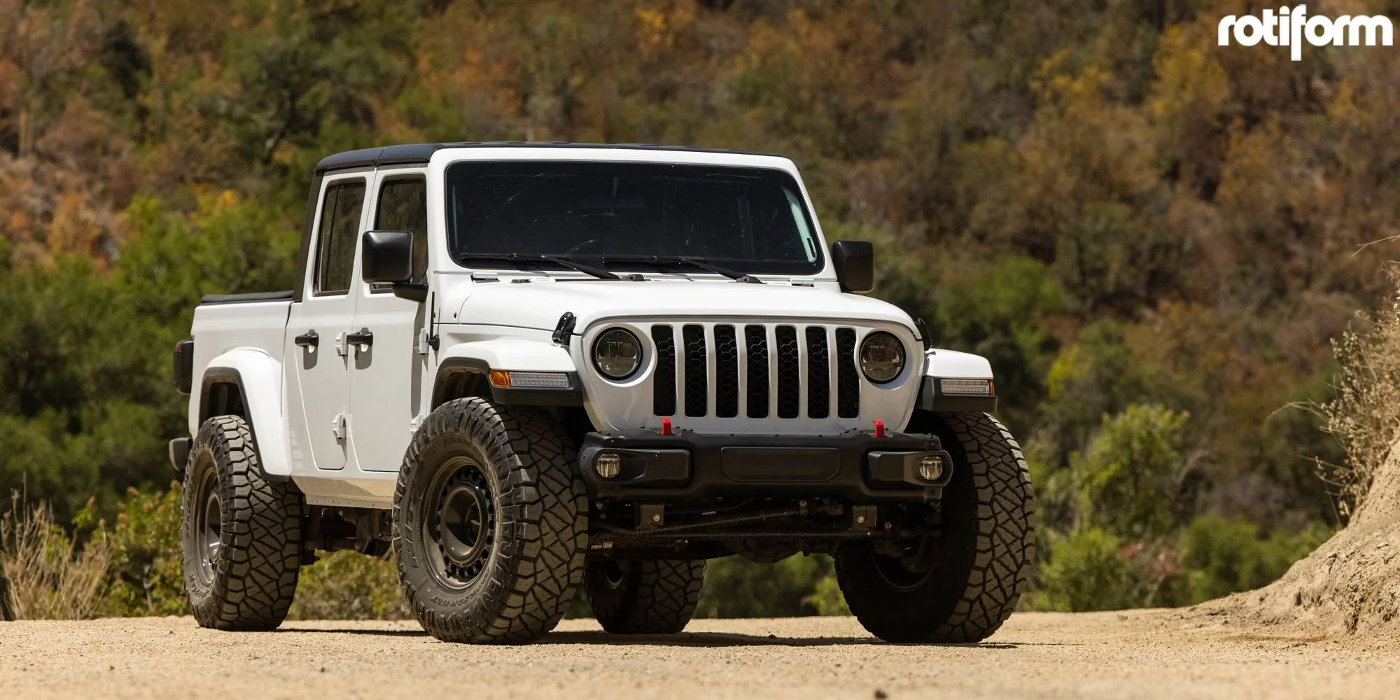 Jeep Gladiator Running OEM 20 hole steelies with 37s 1707751279509