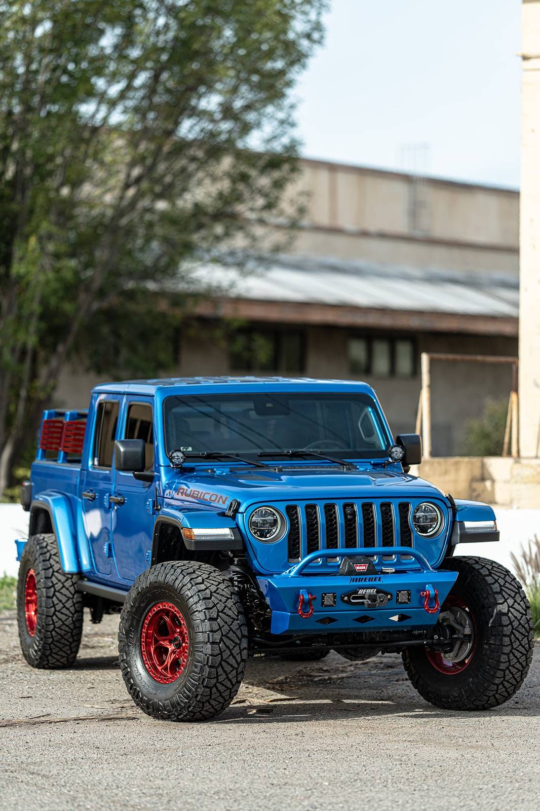 Jeep Gladiator What do you guys think of red wheels with the pearl blue Rebel Photo Shoot 26
