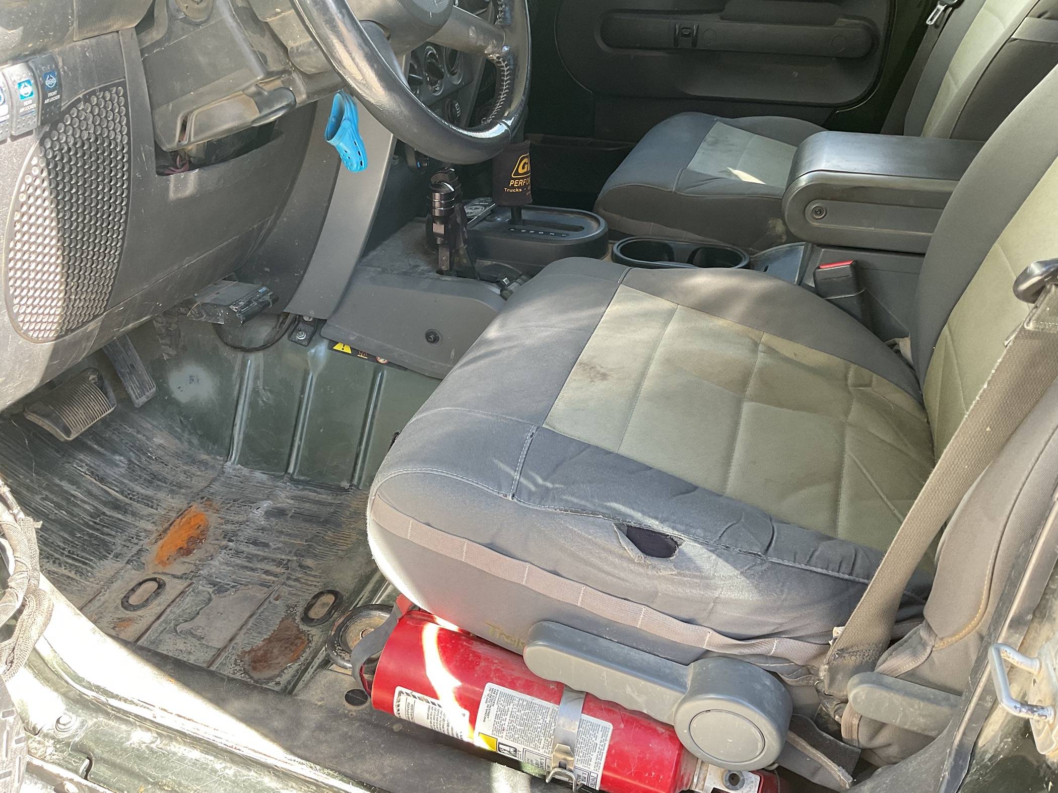 Jeep Gladiator Bartact rear seat cover - told to cut my own holes IMG_1968