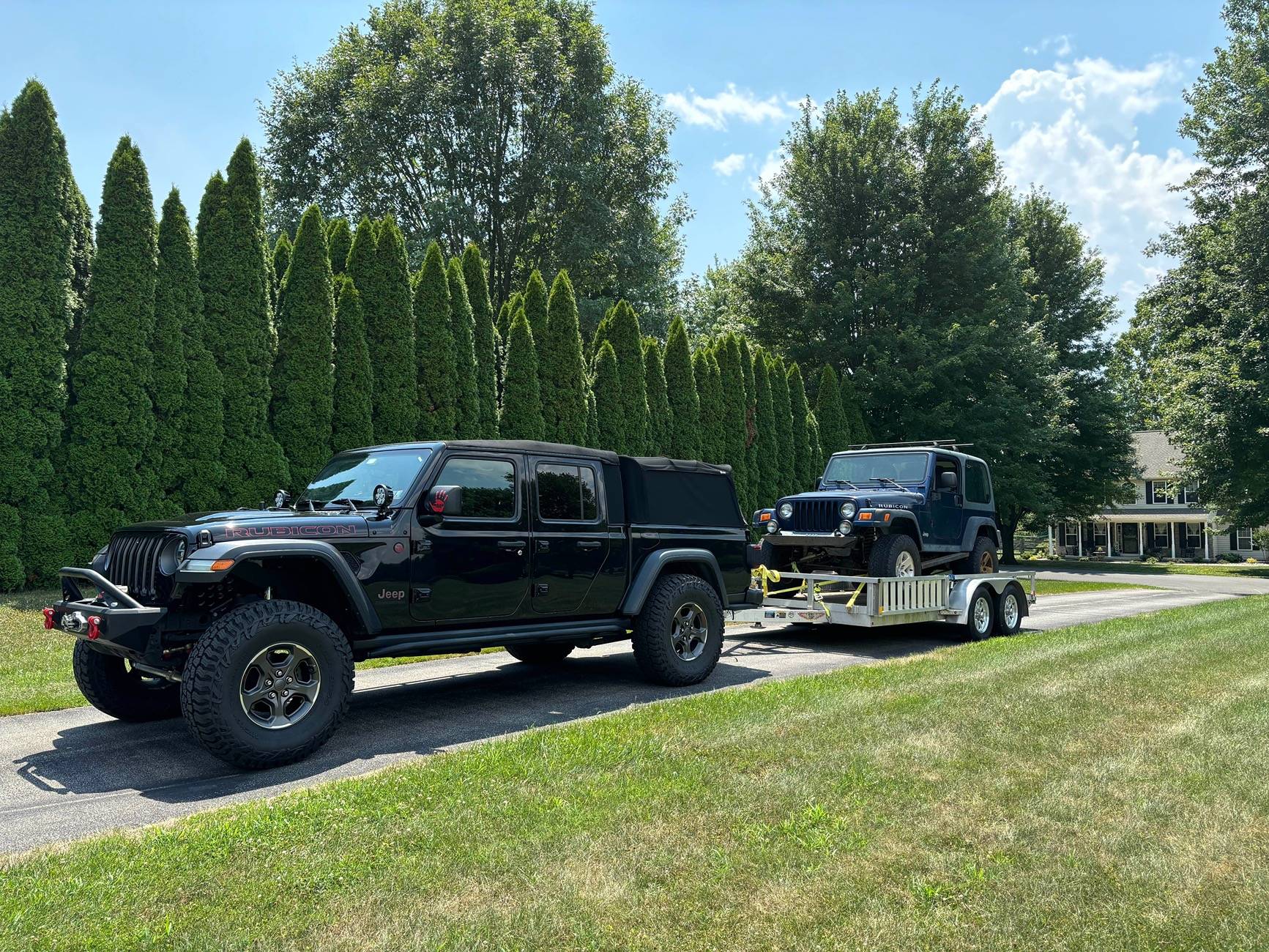 Jeep Gladiator So, what is everybody towing? TJ on trailer 
