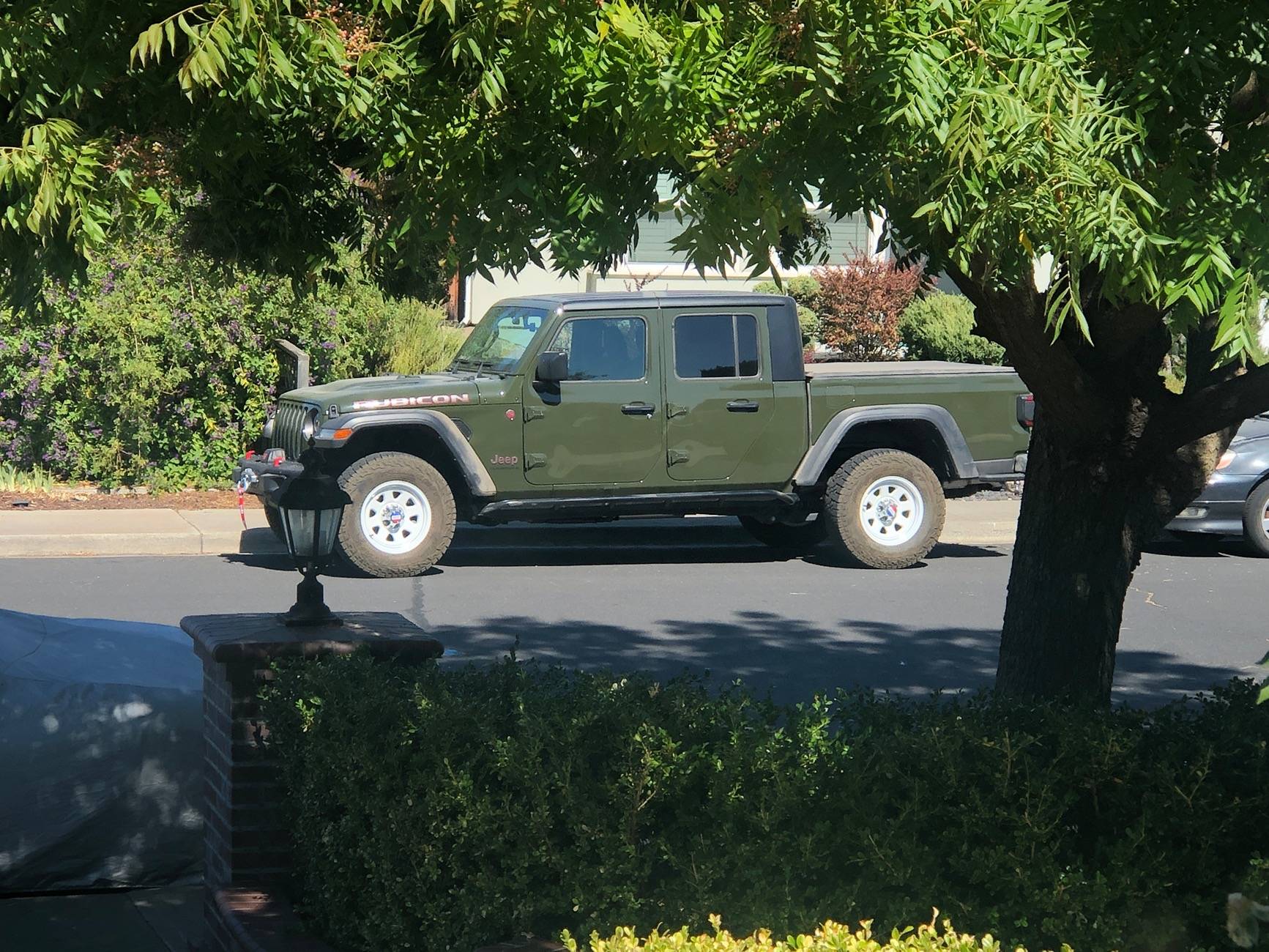 Jeep Gladiator White CJ retro wheels on a Sarge Green Gladiator C75CD16C-E454-4444-9026-175903F2E3FB