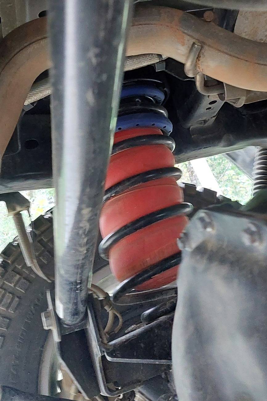 Jeep Gladiator Going to see if airbags will help with rooftop tent seaying suspension. 20241102_142235