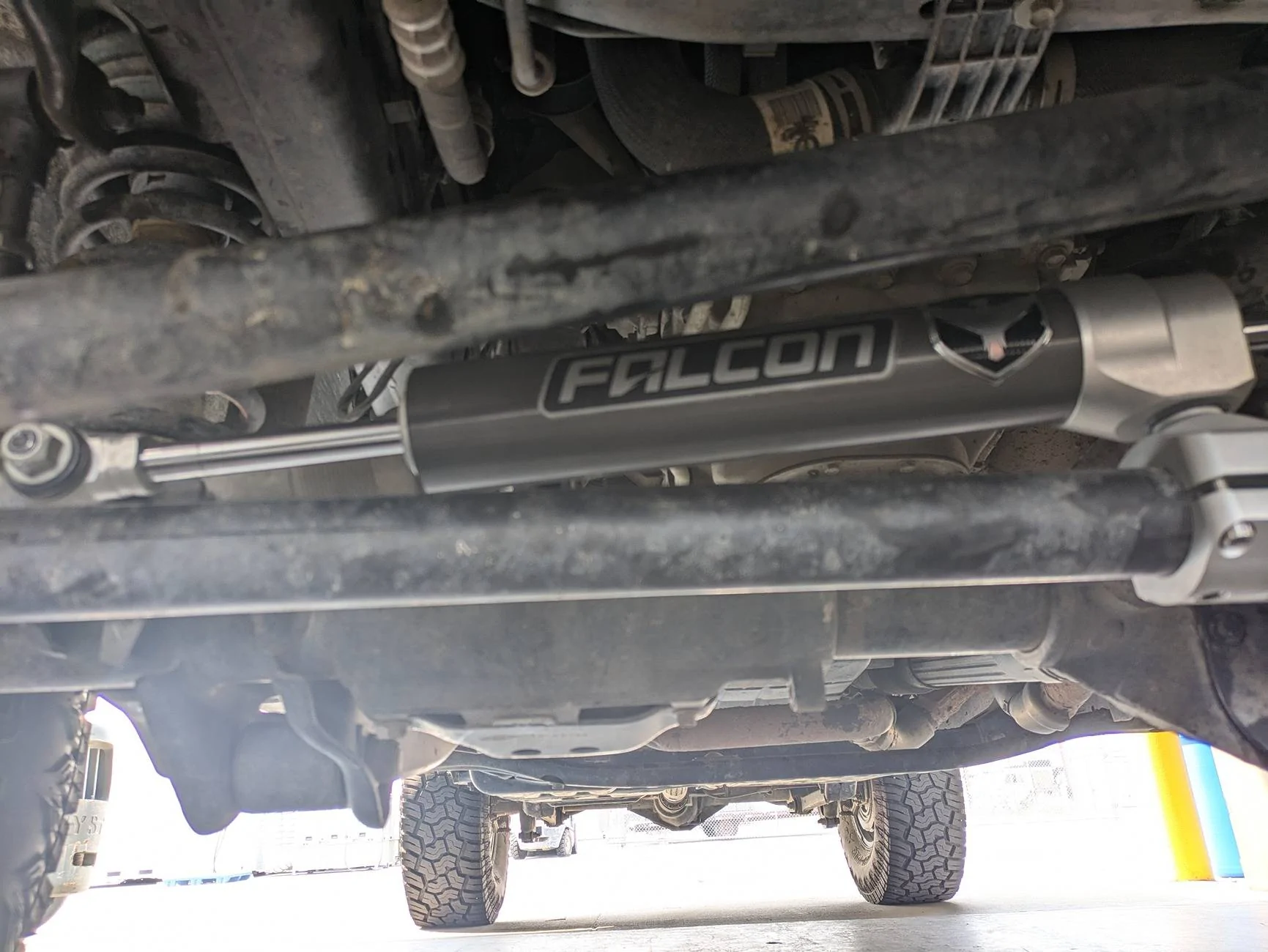 Jeep Gladiator Steering stabilizer install -- better to stock mount it or mount it on the tie rod? PXL_20240830_202907689