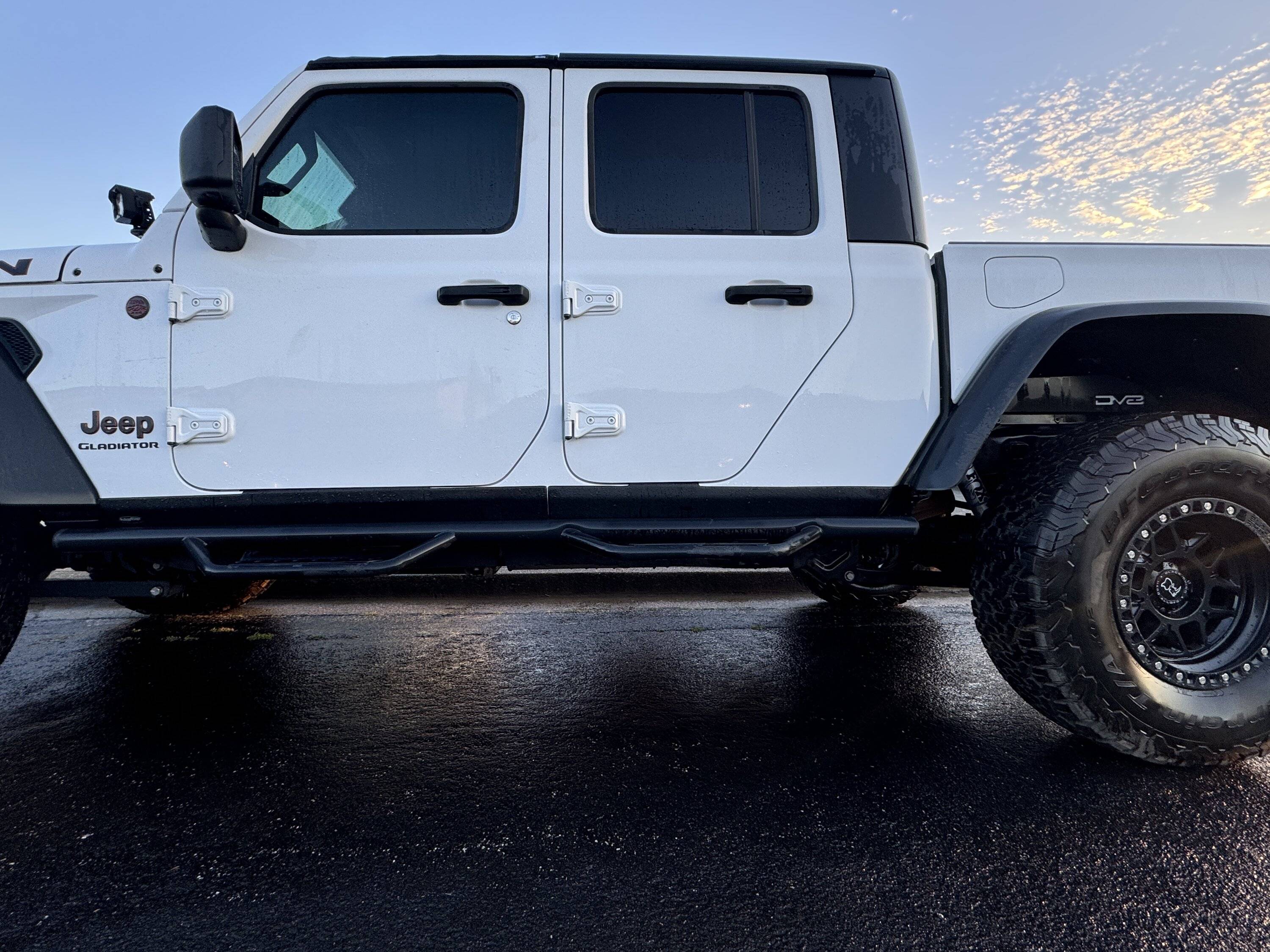 Jeep Gladiator N-fab steps with slight damage on drivers rear step IMG_7081