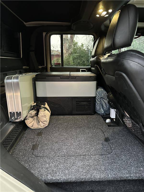 Jeep Gladiator Who's running a fridge in the back seat? be42f661-4786-4f75-85d8-a3bf0dc98097