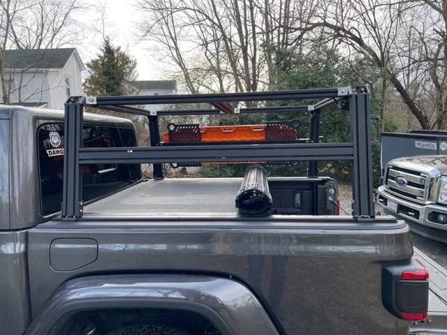 Jeep Gladiator Rack Recommendations tonneau rolled withXO
