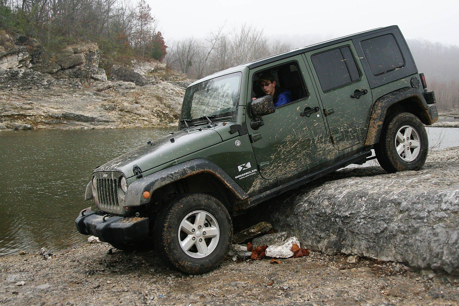 Jeep Gladiator What are the realistic expectations from a stock Sport? JK-Forum at Disney, Dec 07, 8044, Curtis Descends a Rock Ledge